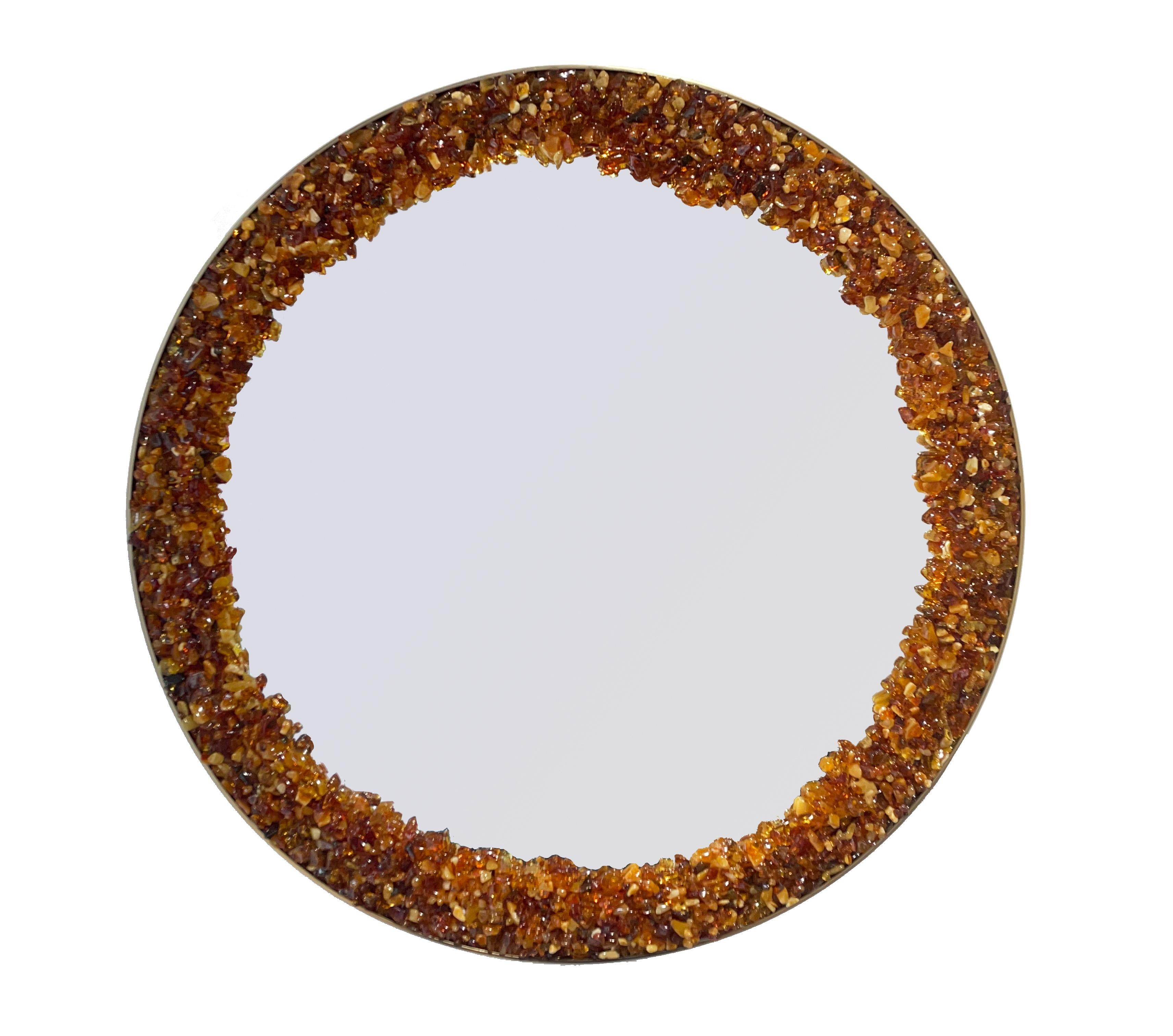 Unique mirror designed by Nicolas Jourdier with Latvian amber.

A solar circle to spread positive energy in your house.

Led backlit.

Amber is a stone that develops positivity enormously. It stimulates the immune system and helps to fight fatigue.