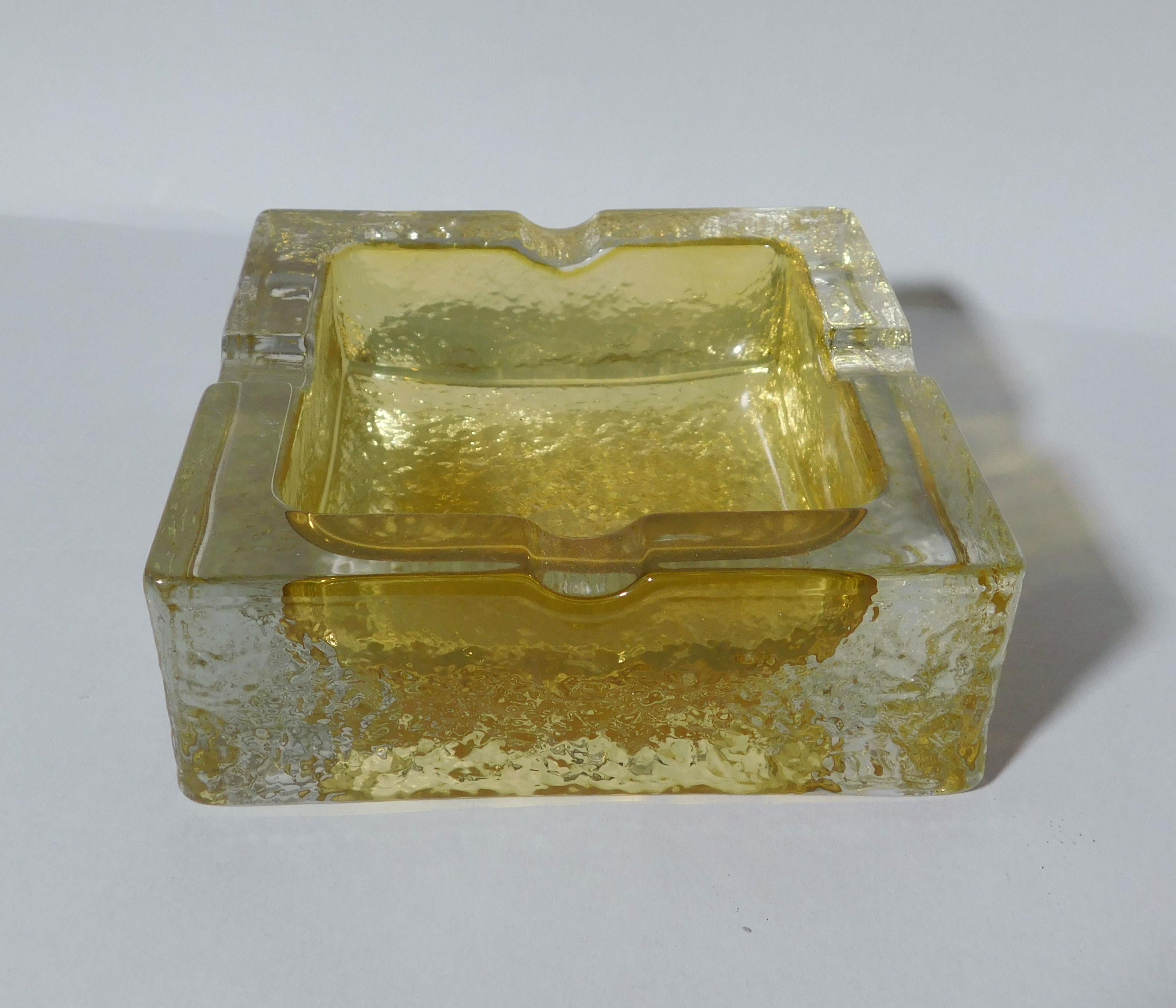 Vintage Italian clear and amber textured Murano glass ashtray / Made in Italy circa 1960s
Length: 5.5 inches / Width: 5.5 inches / Height: 2 inches
2 available in stock in Italy, price listed is for each item
Order Reference #: FABIOLTD L115
This