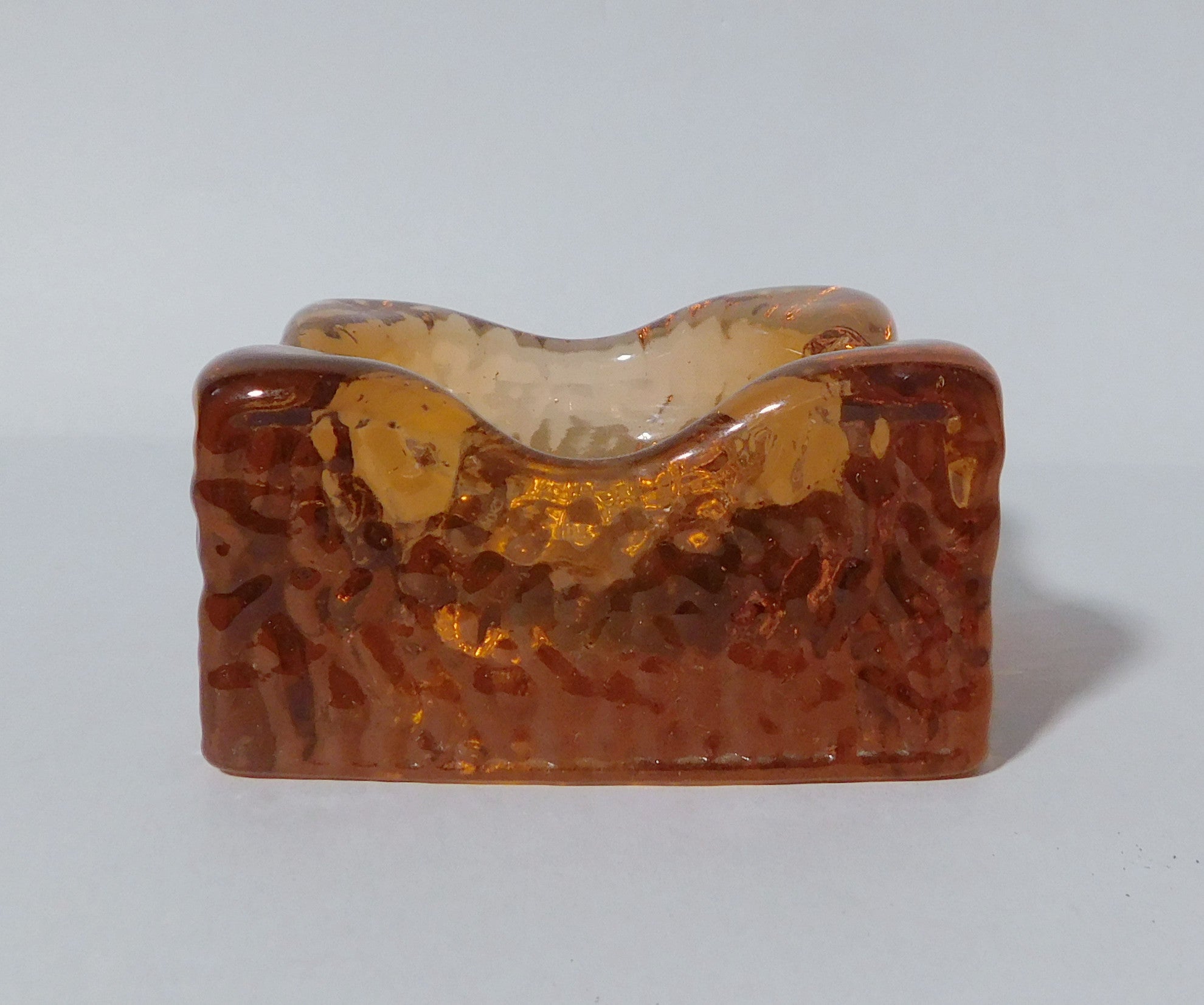 Vintage Italian dark amber Murano glass ashtray or bowl / Made in Italy, circa 1960s
Measures: width 3.5 inches, depth 3.5 inches, height 2 inches
1 available in stock in Italy
Order Reference #: FABIOLTD L118
This piece makes for great and unique