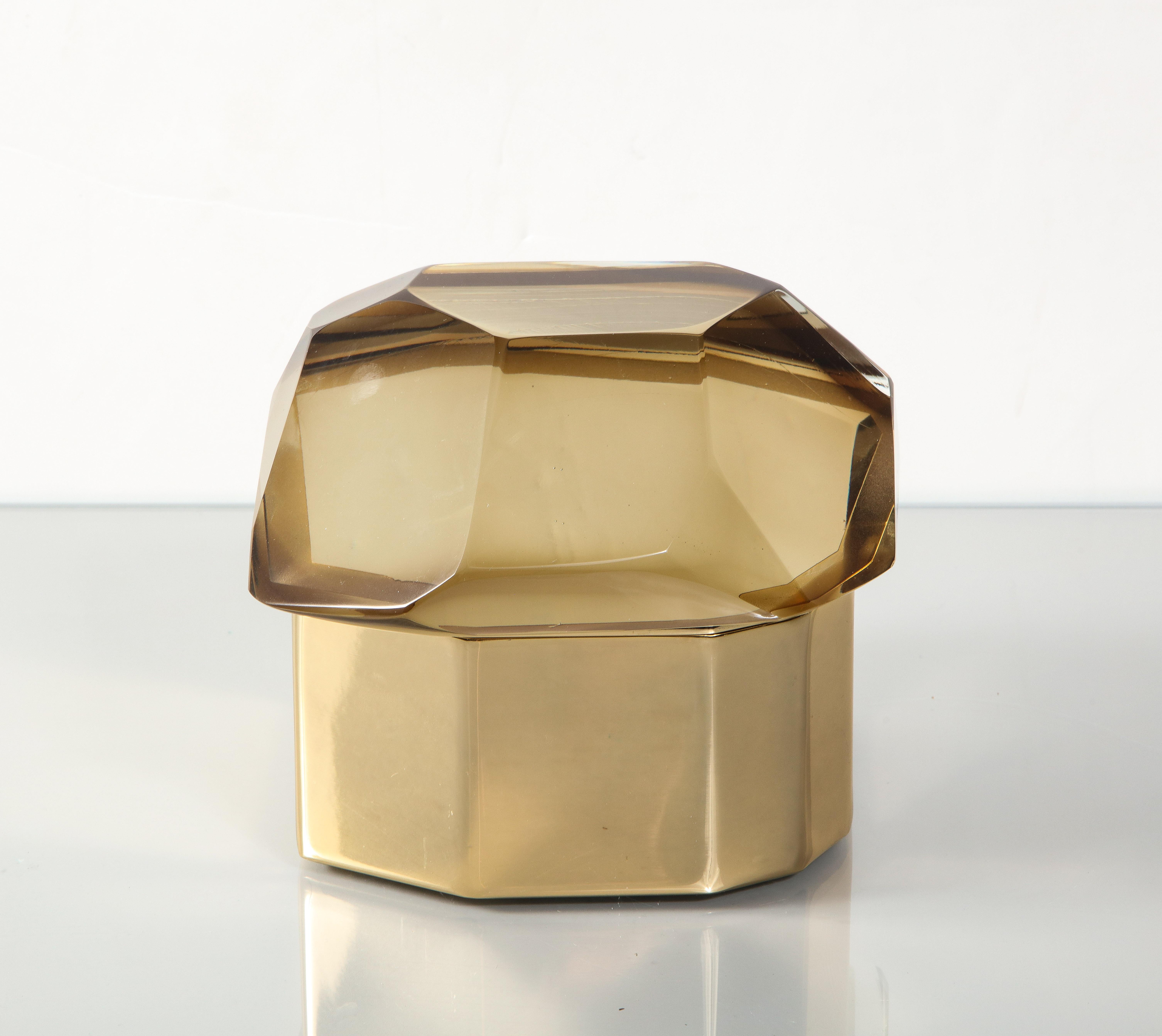 This Italian Murano glass and polished brass jewelry box is available for immediate purchase. Variations are available to glass color.