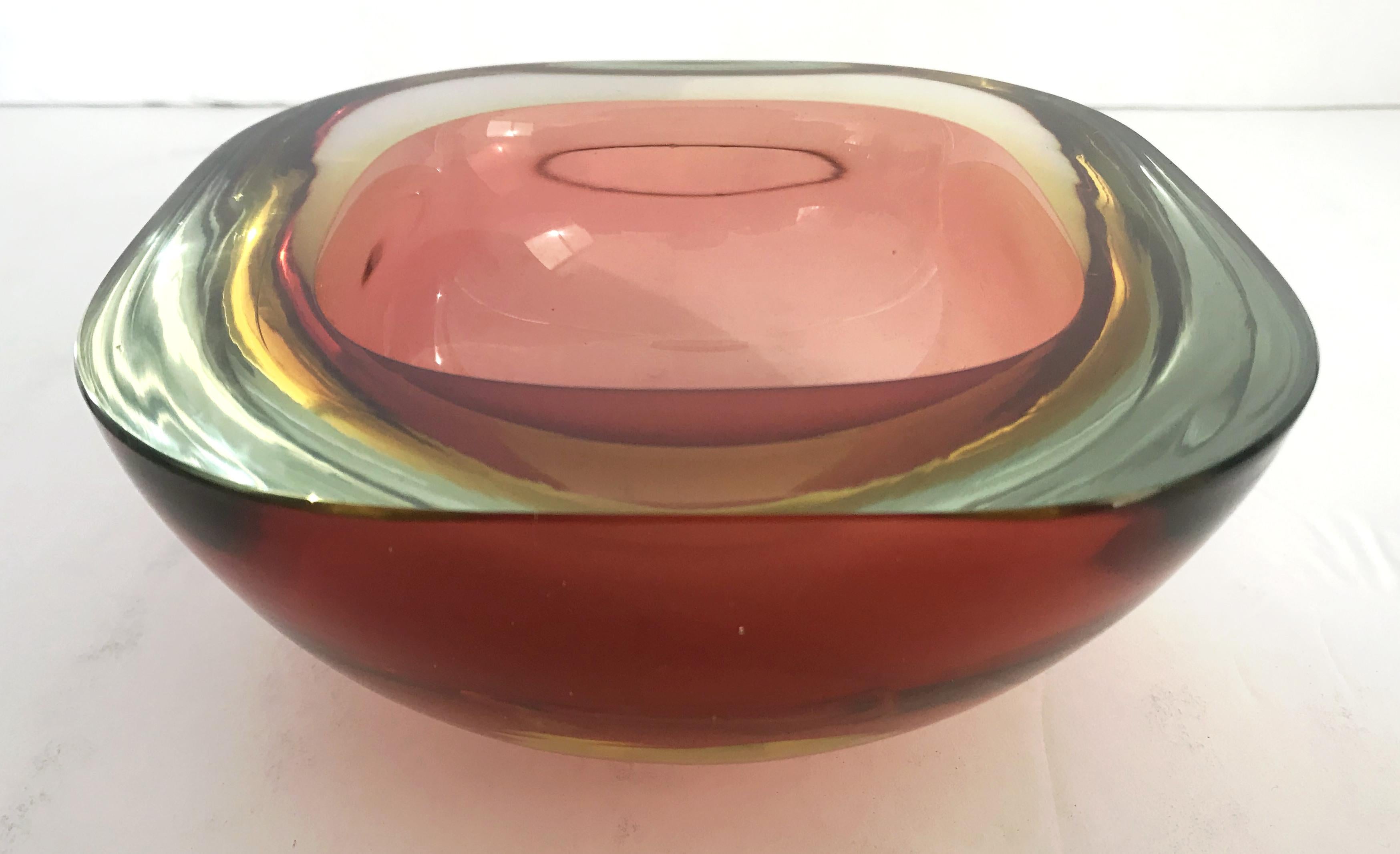 Vintage Italian amber Murano glass bowl blown in Sommerso technique / Made in Italy, circa 1960s
Measures: width 6 inches, depth 6 inches, height 2.5 inches
1 in stock in Los Angeles
Order Reference #: FABIOLTD G180
This piece makes for great and