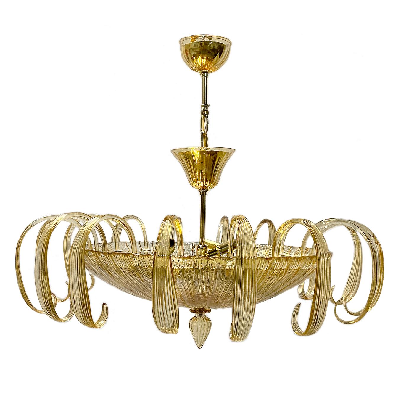 A circa 1950's hand blown champagne tone Murano glass chandelier with interior lights.

Measurements:
Diameter 33?
Current drop 30?
Minimum drop 18?
