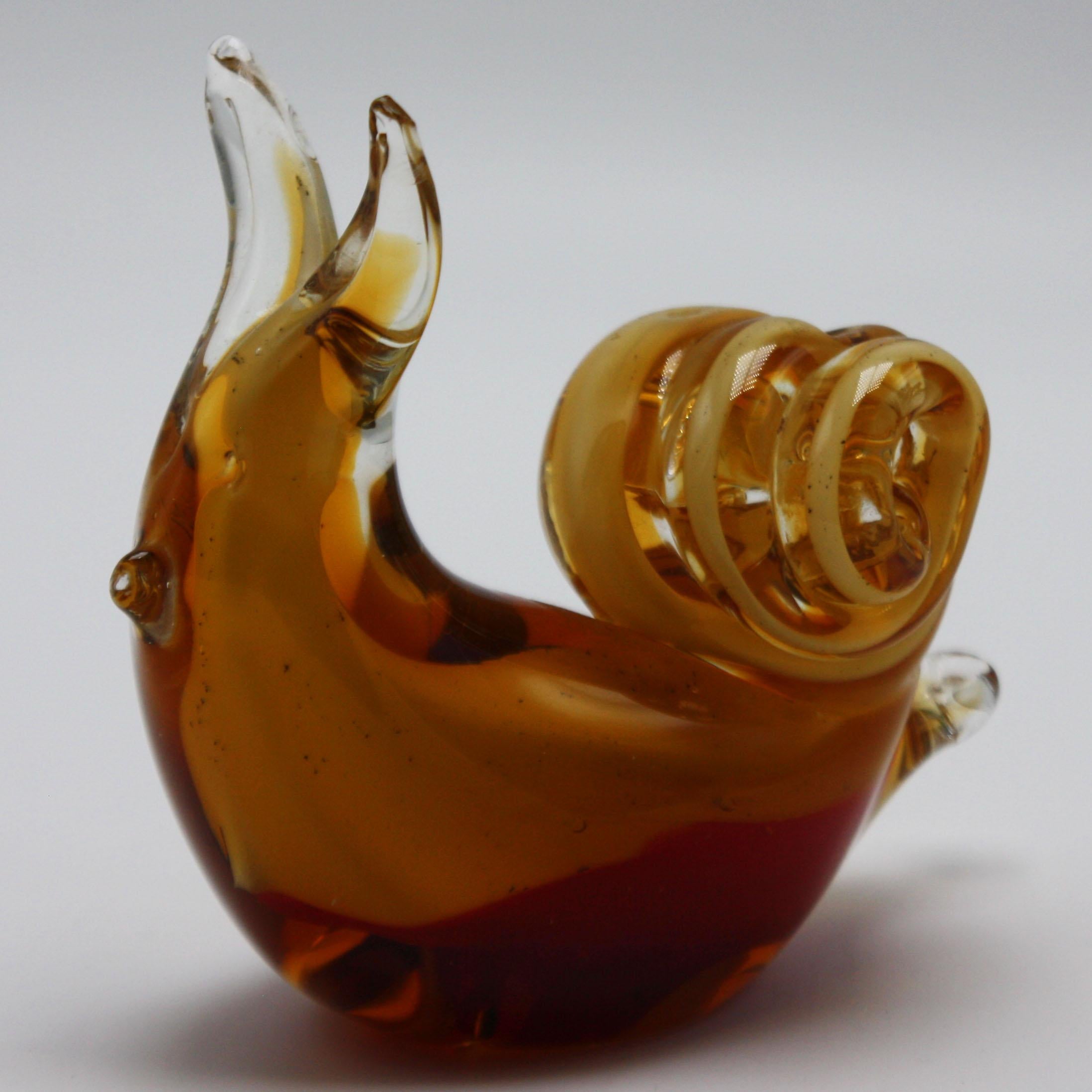 Amber Murano glass snail with gold details, circa 1970.
   