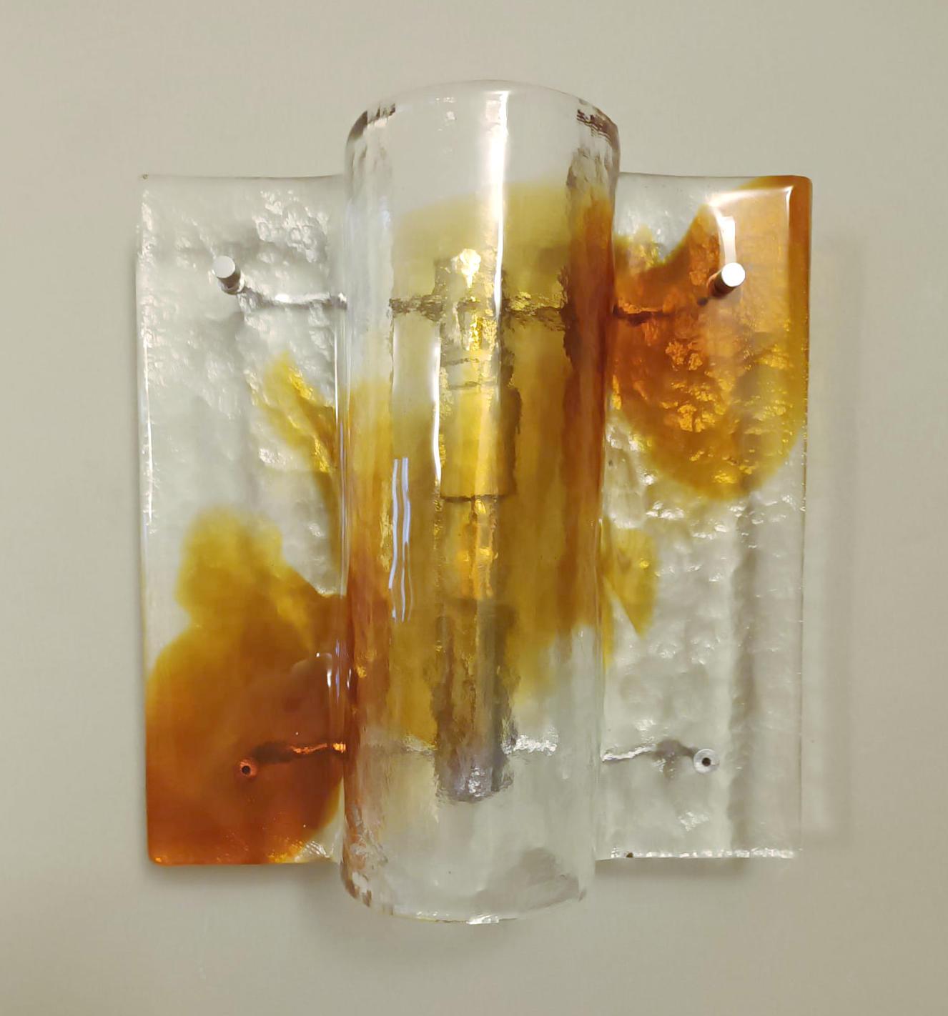Italian wall lights with clear and amber Murano glass shades mounted on chrome brackets / Made in Italy by Mazzega, circa 1960s
1 light / E12 or E14 type / max 40W
Measures: Height 12 inches, width 11.5 inches, depth 6 inches
3 available in stock