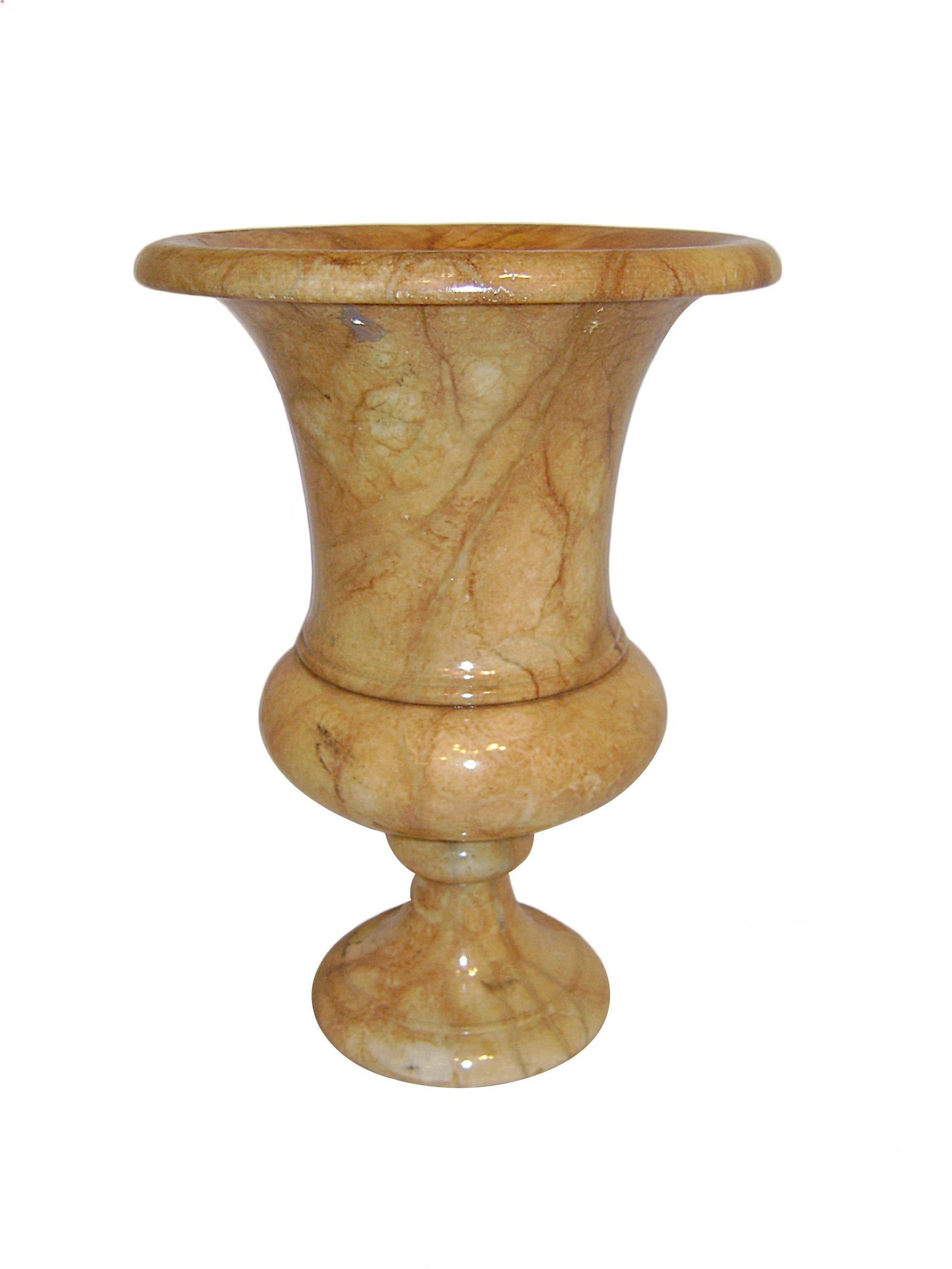 A circa 1920's Italian single carved alabaster urn table lamp with interior light.

Measurements:
Height: 13.5