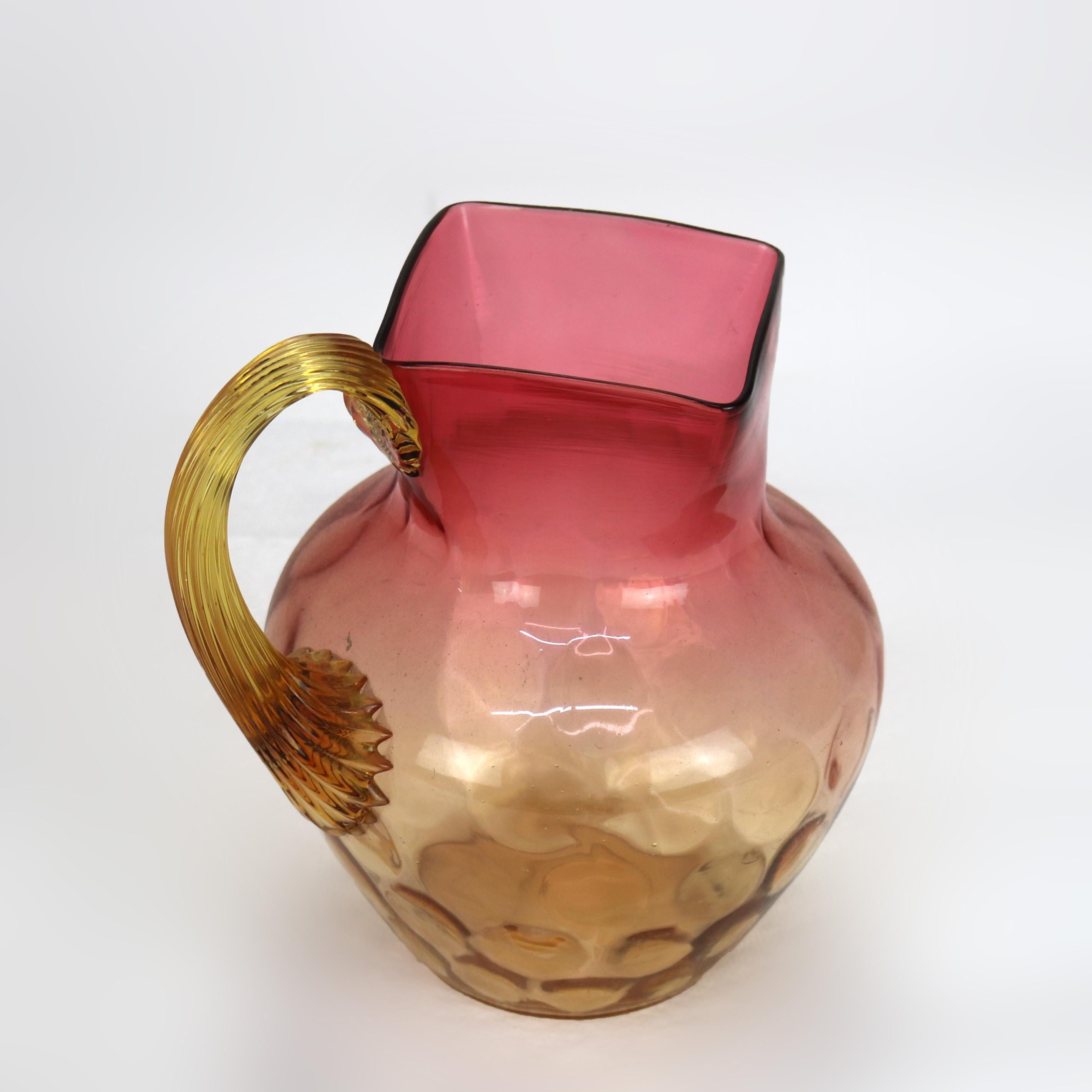 Amberina Coinspot Glass Juice Pitcher with Applied Reeded Glass Handle c1940

Measures - 7 3/4