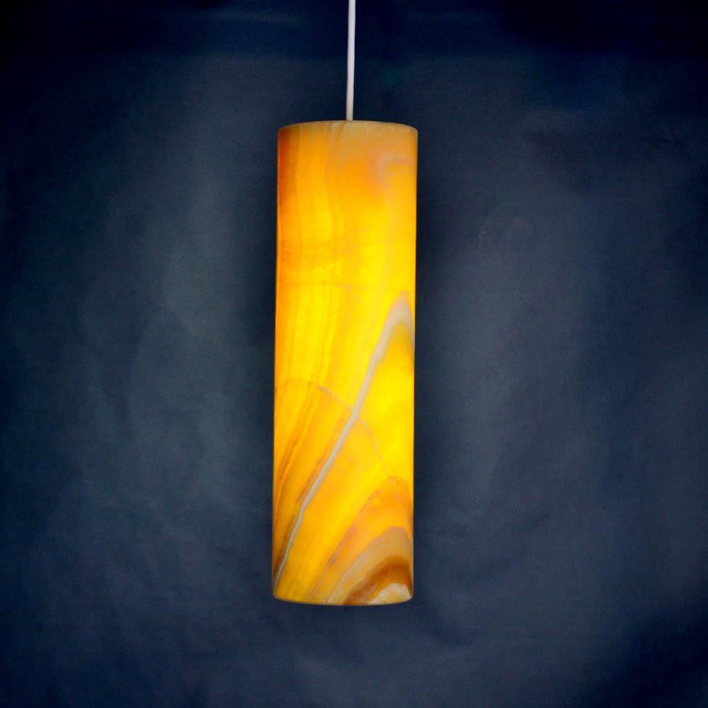 Cylinder rainbow ceiling lamp in onyx. Beautifully handcrafted lamp from yellow/orange striped onyx.