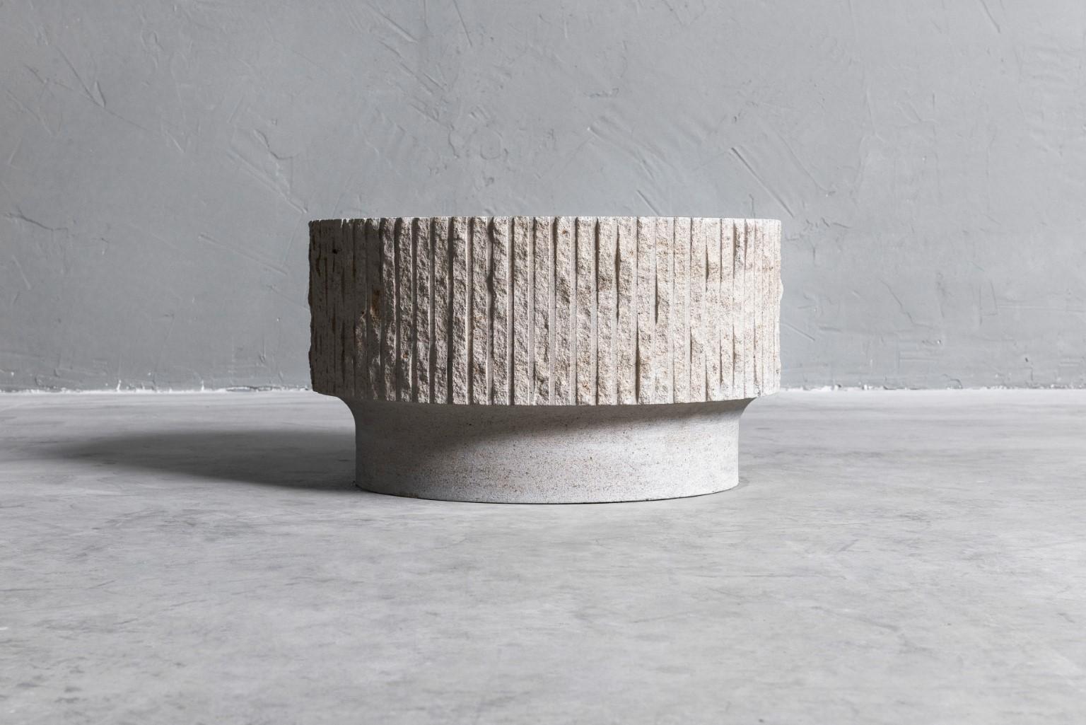 Limestone and brass sculpted coffee table by Frederic Saulou
Large coffee table
Materials: Buffon Limestone, patinated brass.
Measures: H 34, D 60 cm, approximately 130 kg
Limited edition of 12
Title: Ambigue
Signed and numbered.

