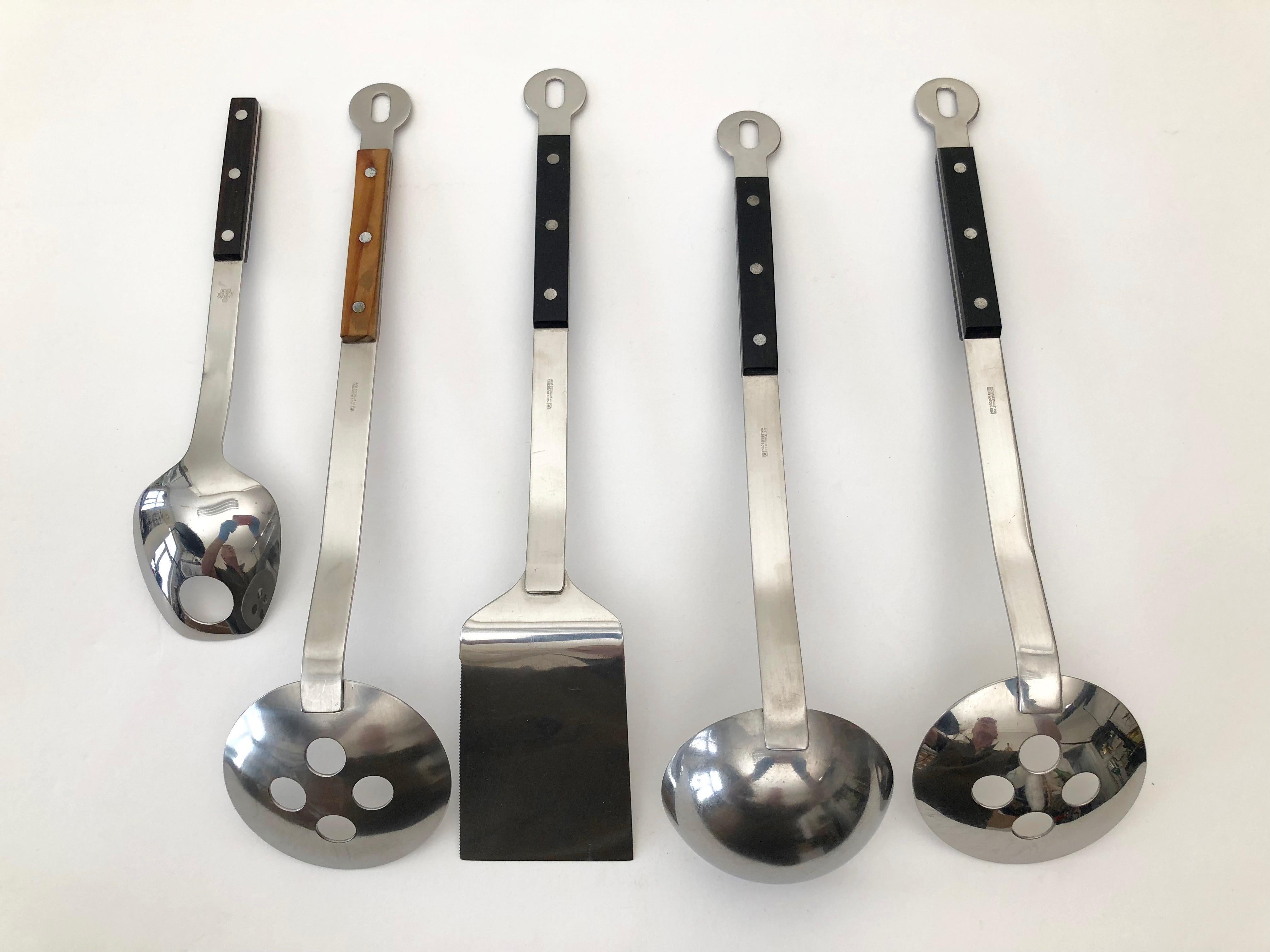 A nice set of kitchen utensils designed by Janos Meglk for Amboss Austria. These instruments have been used but are in very good condition.
There are five pieces in the set, 2 spoons with holes, 35 cm long x 8.5 cm wide x 5.3 high, 1 ladle 33 cm