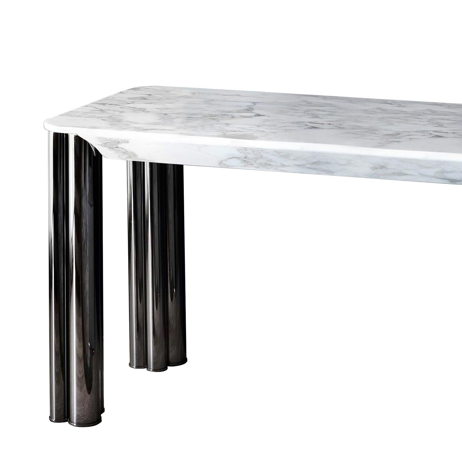 Console table Ambra with 4 feet in steel in blackened chrome
finish. With white calacatta oro marble top.
Measures: L 160 x D 60 x H 75cm, price: 17900,00€.
Also available with white valentine grey marble or emperador
marble top or black and