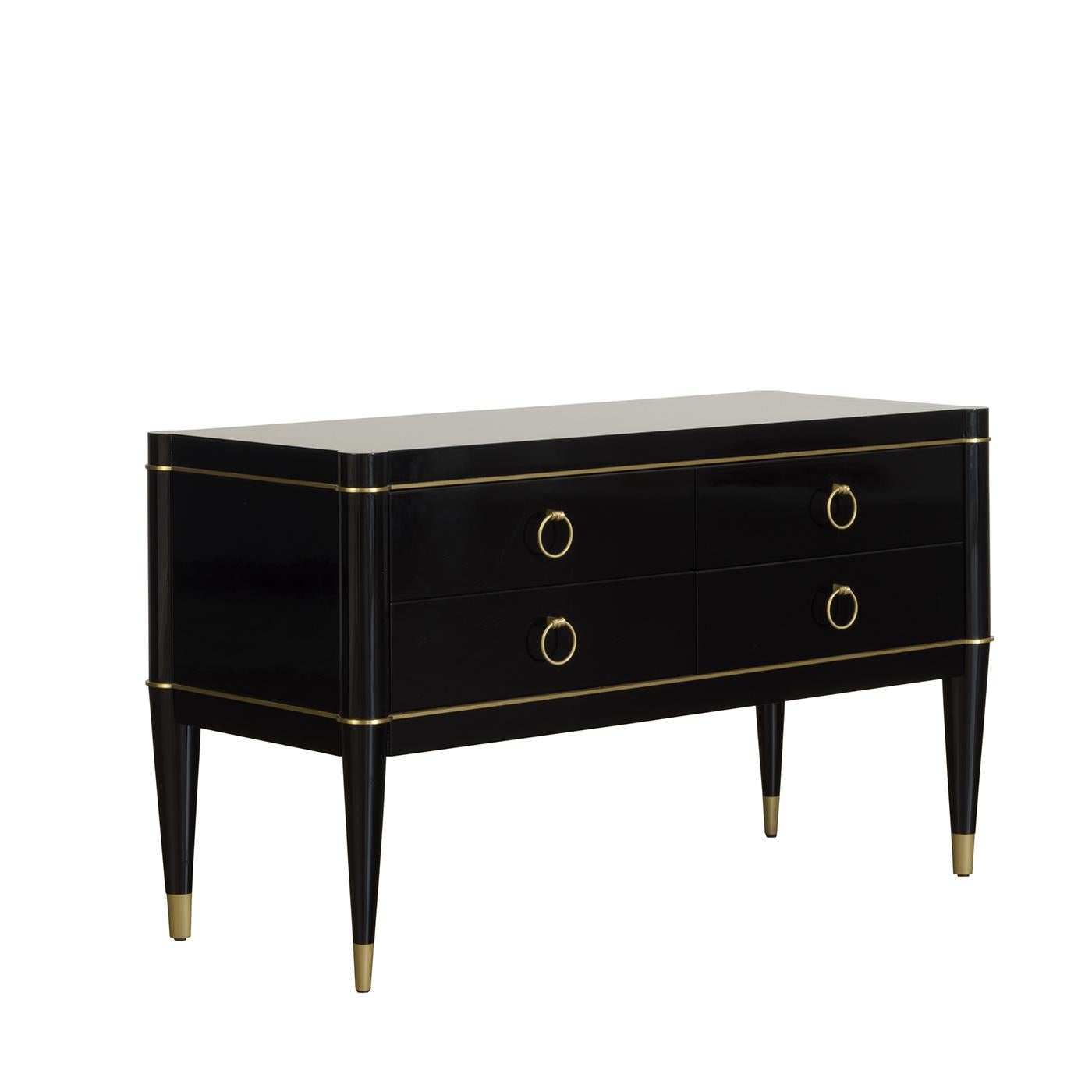 This stunning sideboard will add a glamorous, retro-chic charm to a Classic or modern interior, used as console in an entryway or as a display or storage space in a living room, private study or dining room. Its linear shape is crafted of solid wood