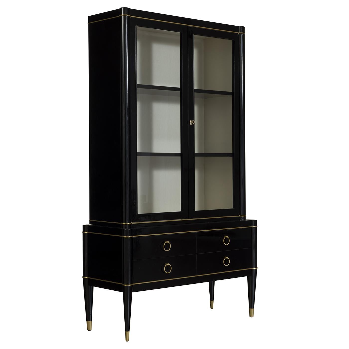This elegant tall cabinet is part of the Ambra collection of fine, timeless pieces. A stunning addition to a Classic home, where it will store and display decorative ceramics and porcelain objects to adorn a stylish dining room, this cabinet was