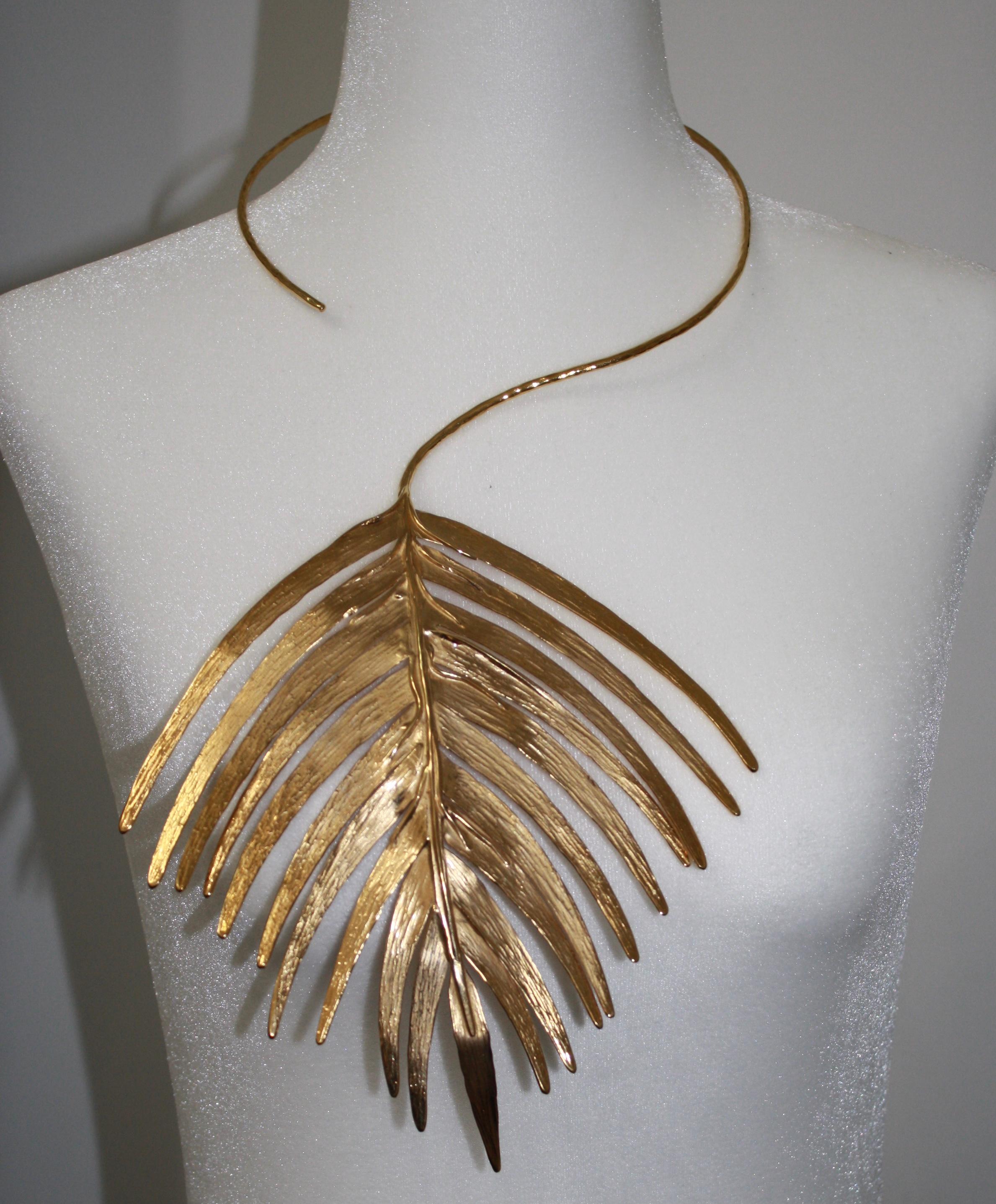 24KT gilded brass limited serie. Metal is very flexible allowing for adjustment around the neck as well as on the bust.