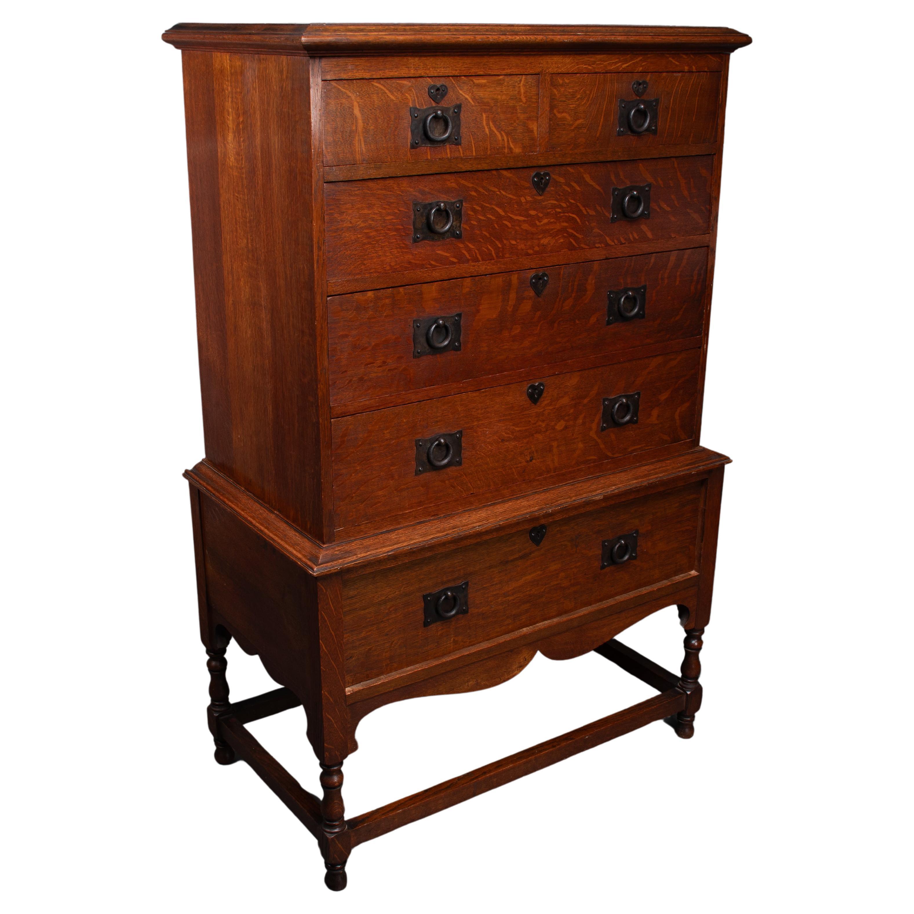 Ambrose Heal A Rare Mansfield Oak Chest of Drawers With Iron Heart Escutcheons For Sale
