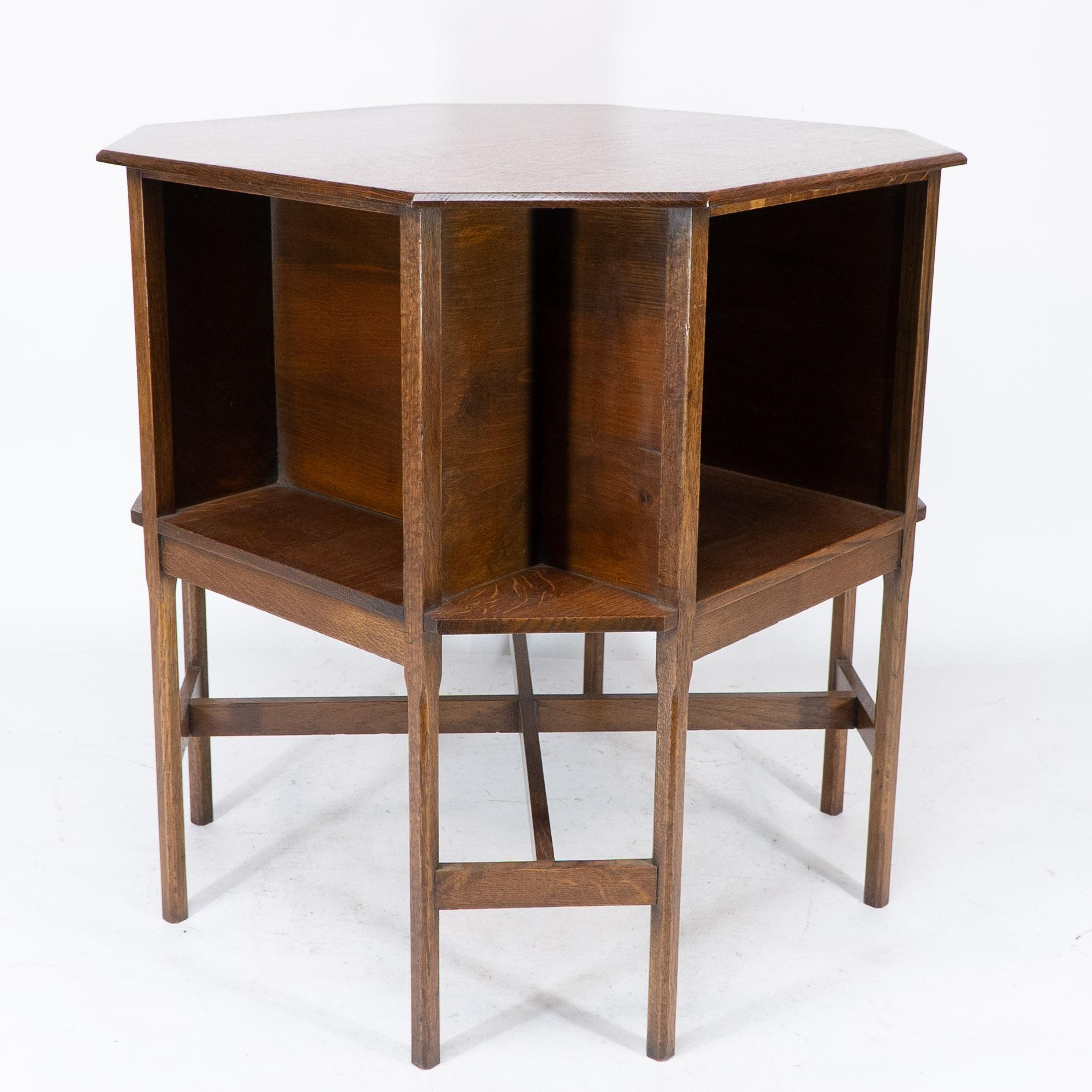 Ambrose Heals attri. An Arts & Crafts oak octagonal book table with eight legs In Good Condition In London, GB