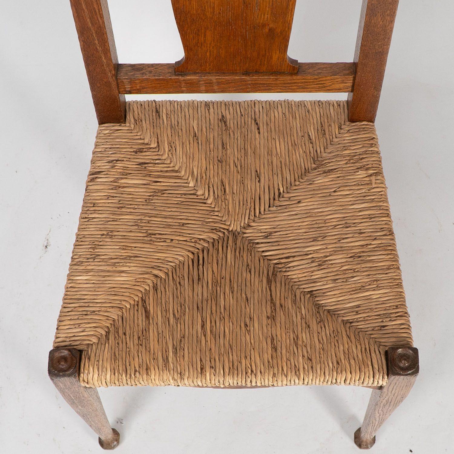 Ambrose Heals for Heals of London. A pair of Arts and Crafts rush seated chairs For Sale 7