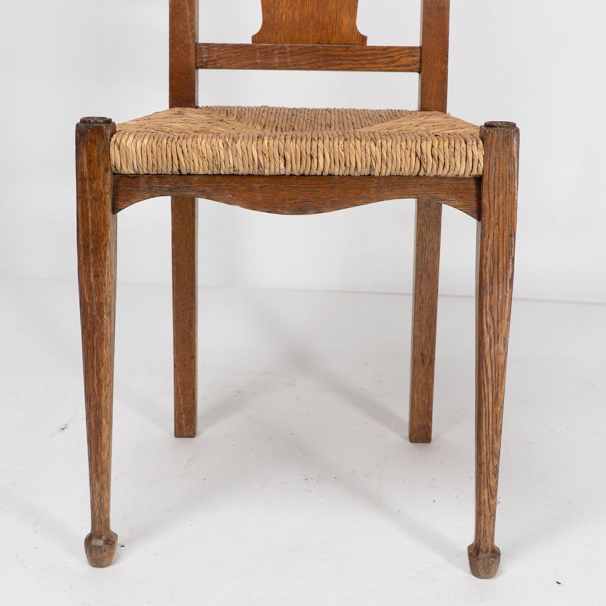 Ambrose Heals for Heals of London. A pair of Arts and Crafts rush seated chairs For Sale 10