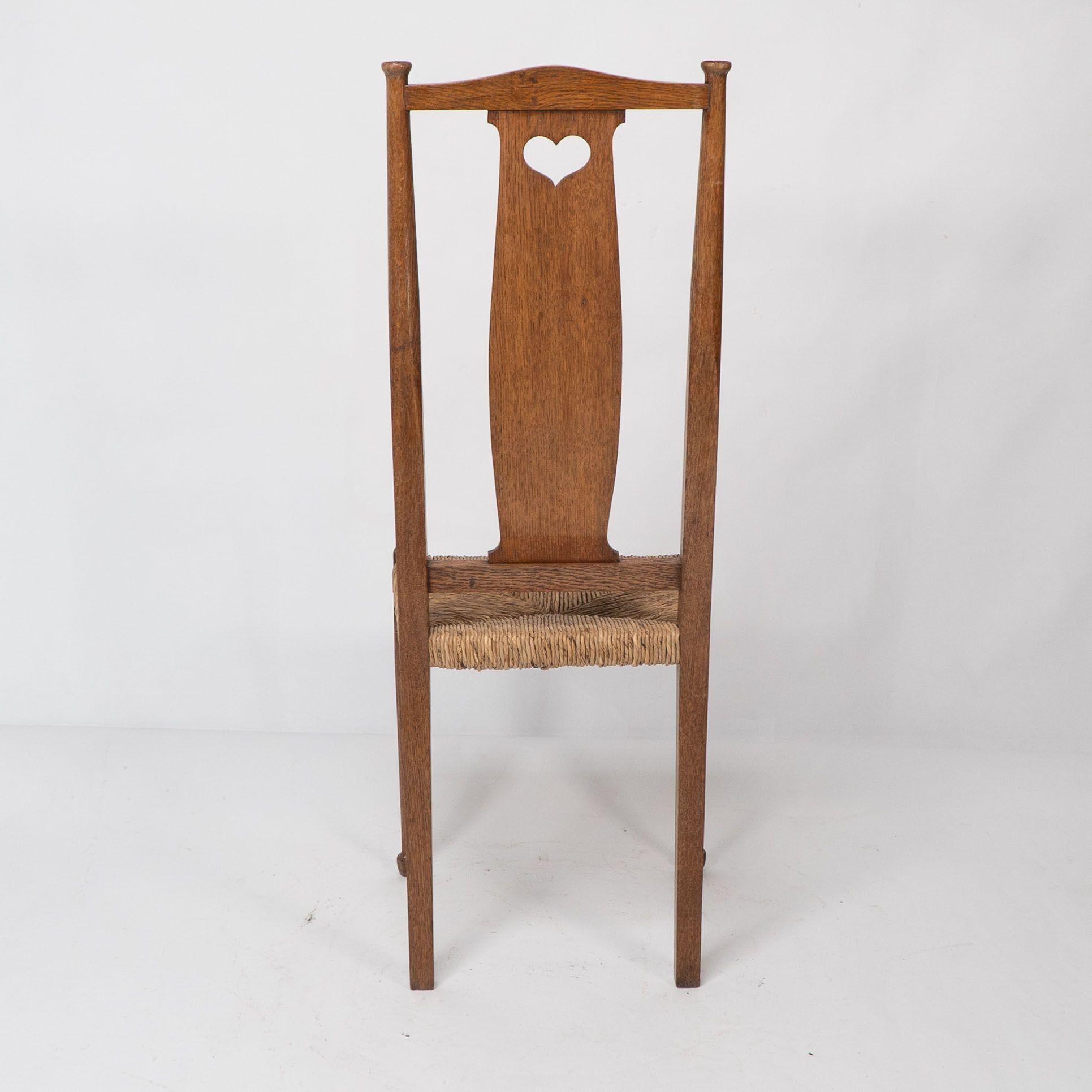 Ambrose Heals for Heals of London. A pair of Arts and Crafts rush seated chairs For Sale 11