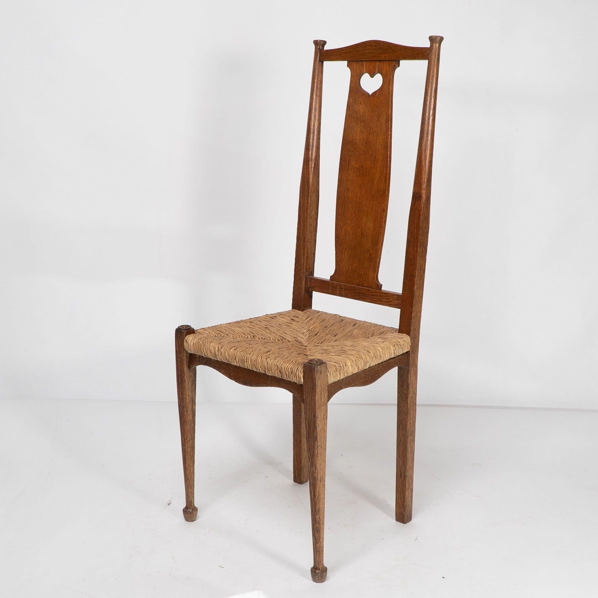 Ambrose Heals for Heals of London. A pair of Arts and Crafts rush seated chairs For Sale 2