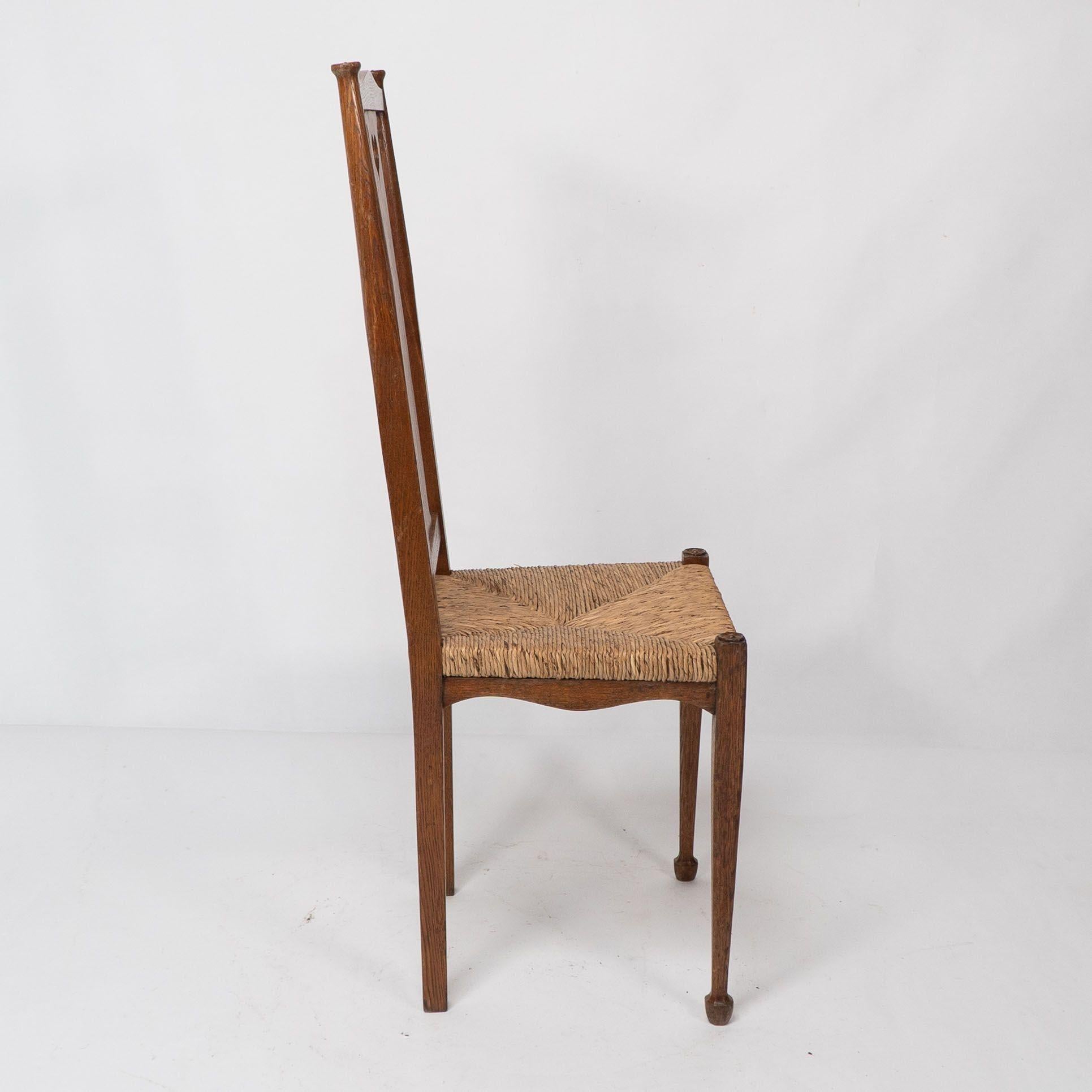 Ambrose Heals for Heals of London. A pair of Arts and Crafts rush seated chairs For Sale 3