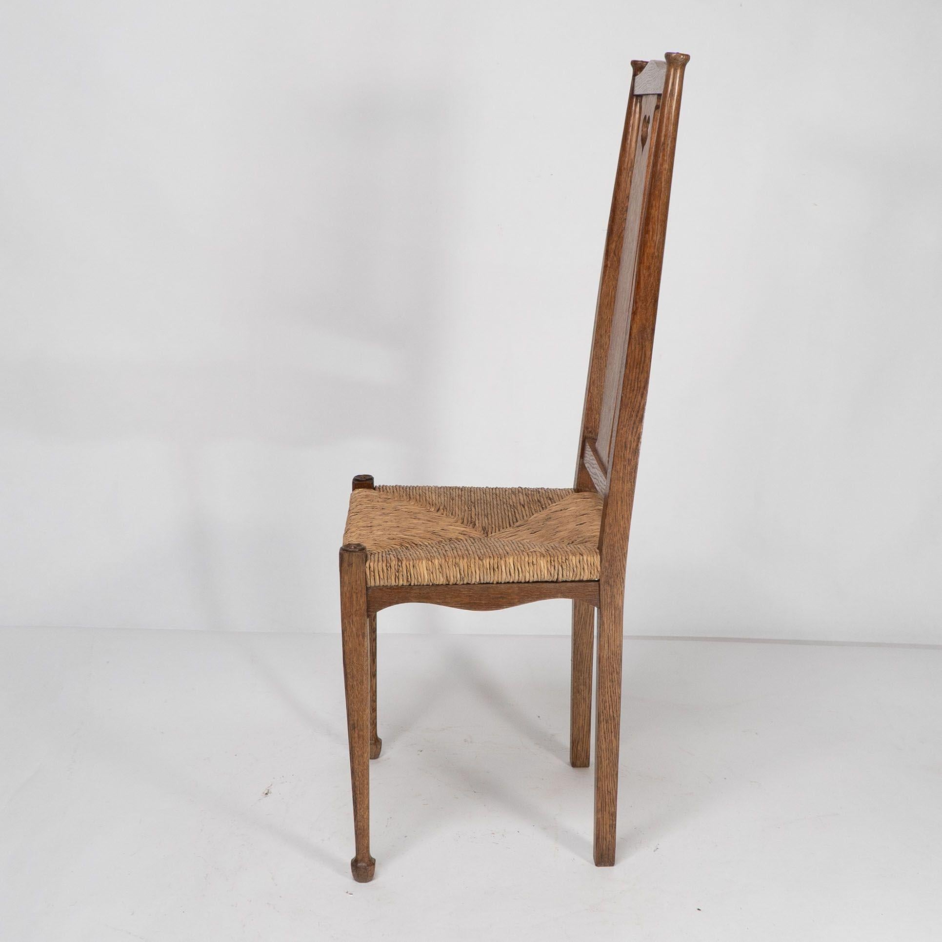 Ambrose Heals for Heals of London. A pair of Arts and Crafts rush seated chairs For Sale 4