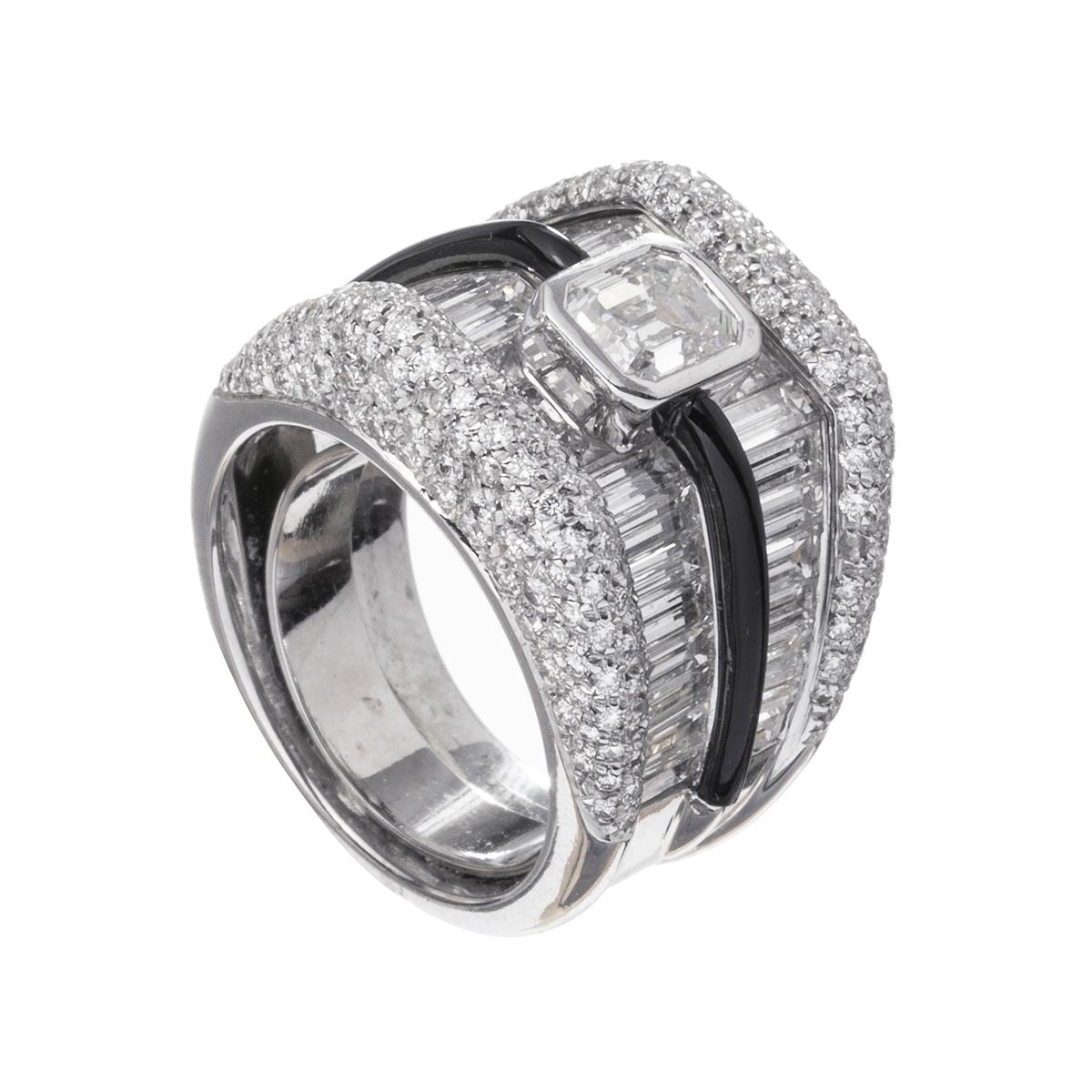 Wide band ring designed by Ambrosi.  Centering a larger bezel-set emerald-cut diamond flanked by a double row of channel-set baguette-cut diamonds separated by black enamel with edges pavé-set with round brilliant-cut diamonds. Handmade in platinum.
