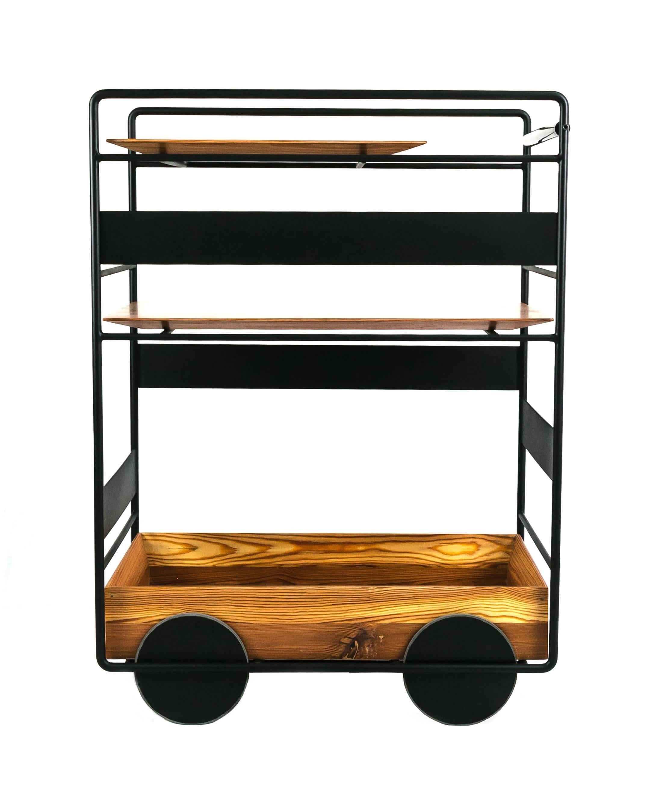 The Ambulante bar trolley (2017) was inspired by the itinerant coffee carts from city of Salvador in Bahia. It can be used as a carriage for drinks, a shelf for books and as support in the kitchen, bathroom or room. Created with the intention to be