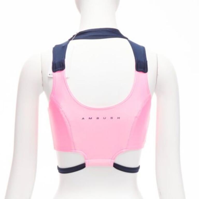 AMBUSH pink navy panelled logo back waist tie cropped sports top Size 1 S
Reference: BSHW/A00031
Brand: Ambush
Material: Polyester, Blend
Color: Navy, Pink
Pattern: Solid
Closure: Snap Buttons
Extra Details: Snap button back neck closure.
Made in: