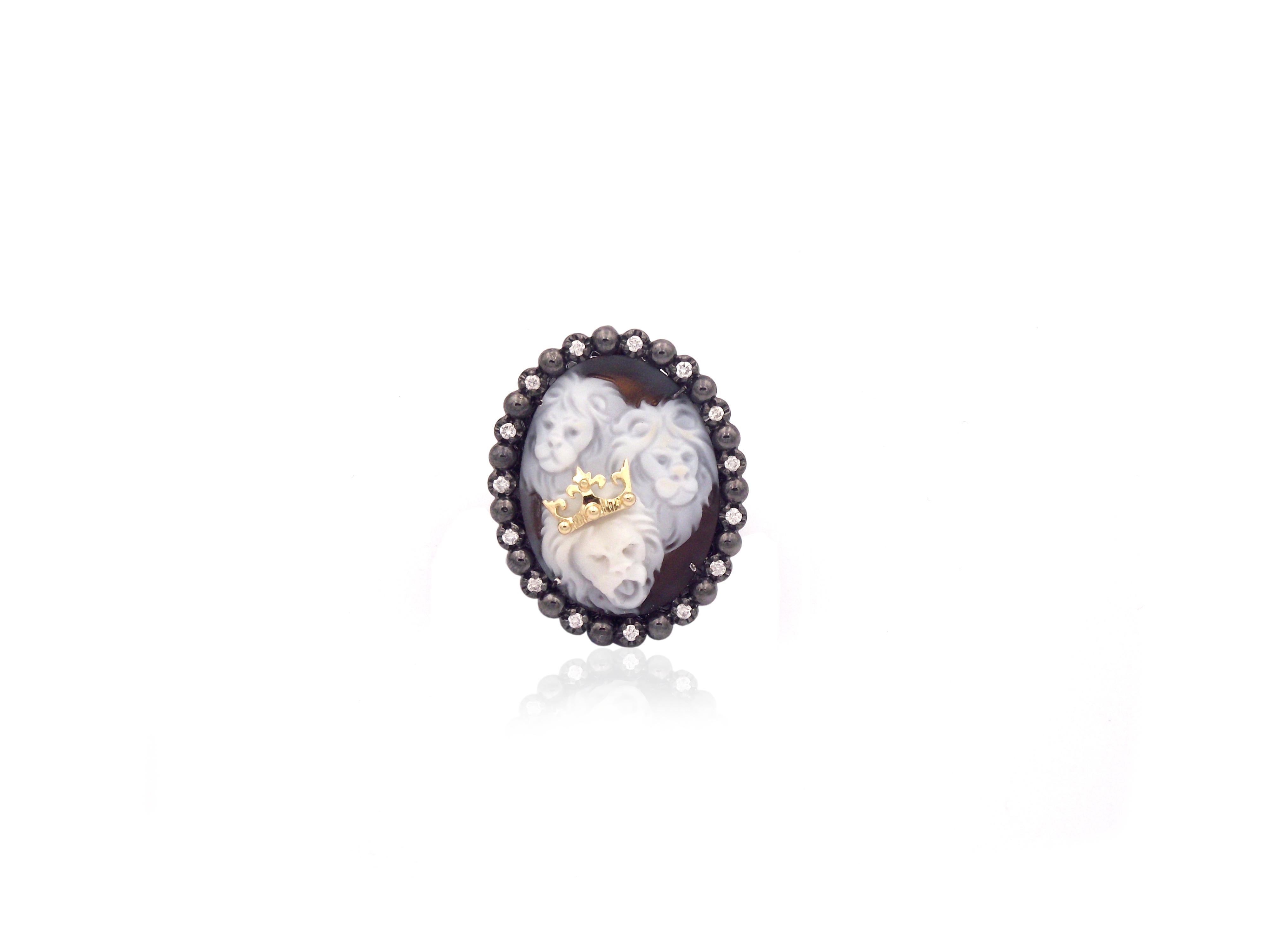  25mm sardonyx shell cameo hand-carved, set on 18kt and sterling silver black rhodium plated with 0.30cts of white diamonds and 0.10cts of rose cut white diamonds