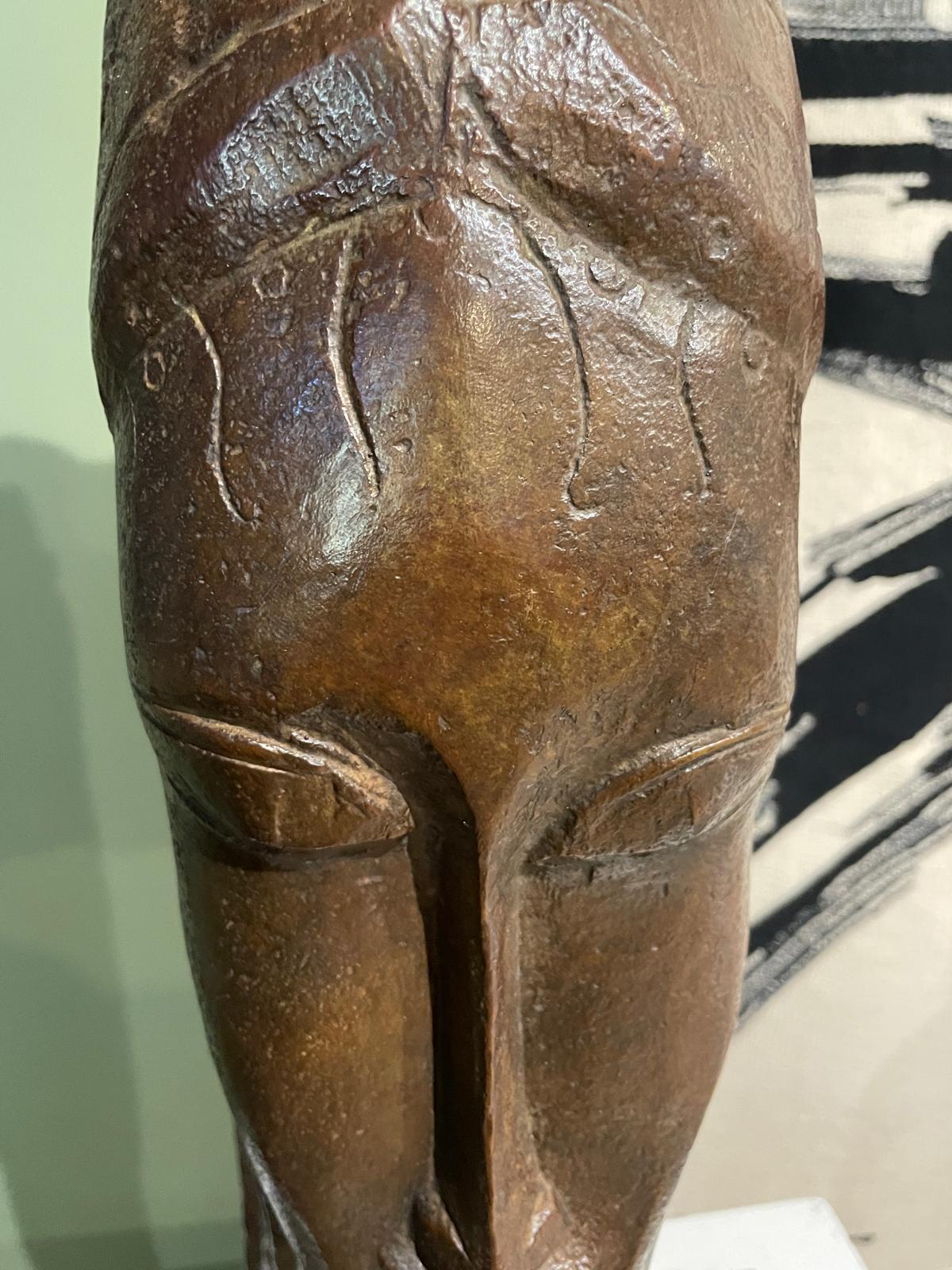 Tête de jeune femme - Modern Sculpture by Amedeo Modigliani