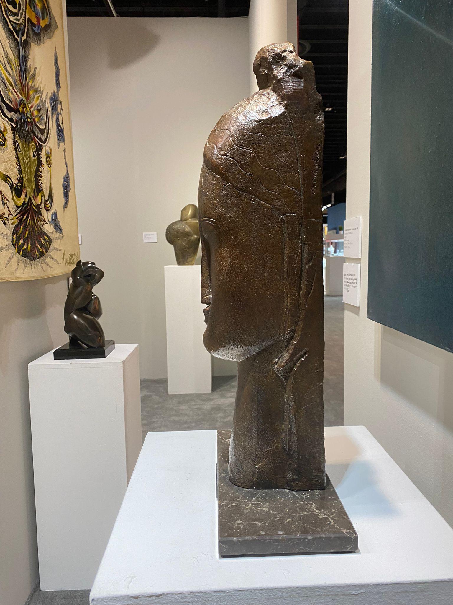 Tête de jeune femme - Sculpture by Amedeo Modigliani