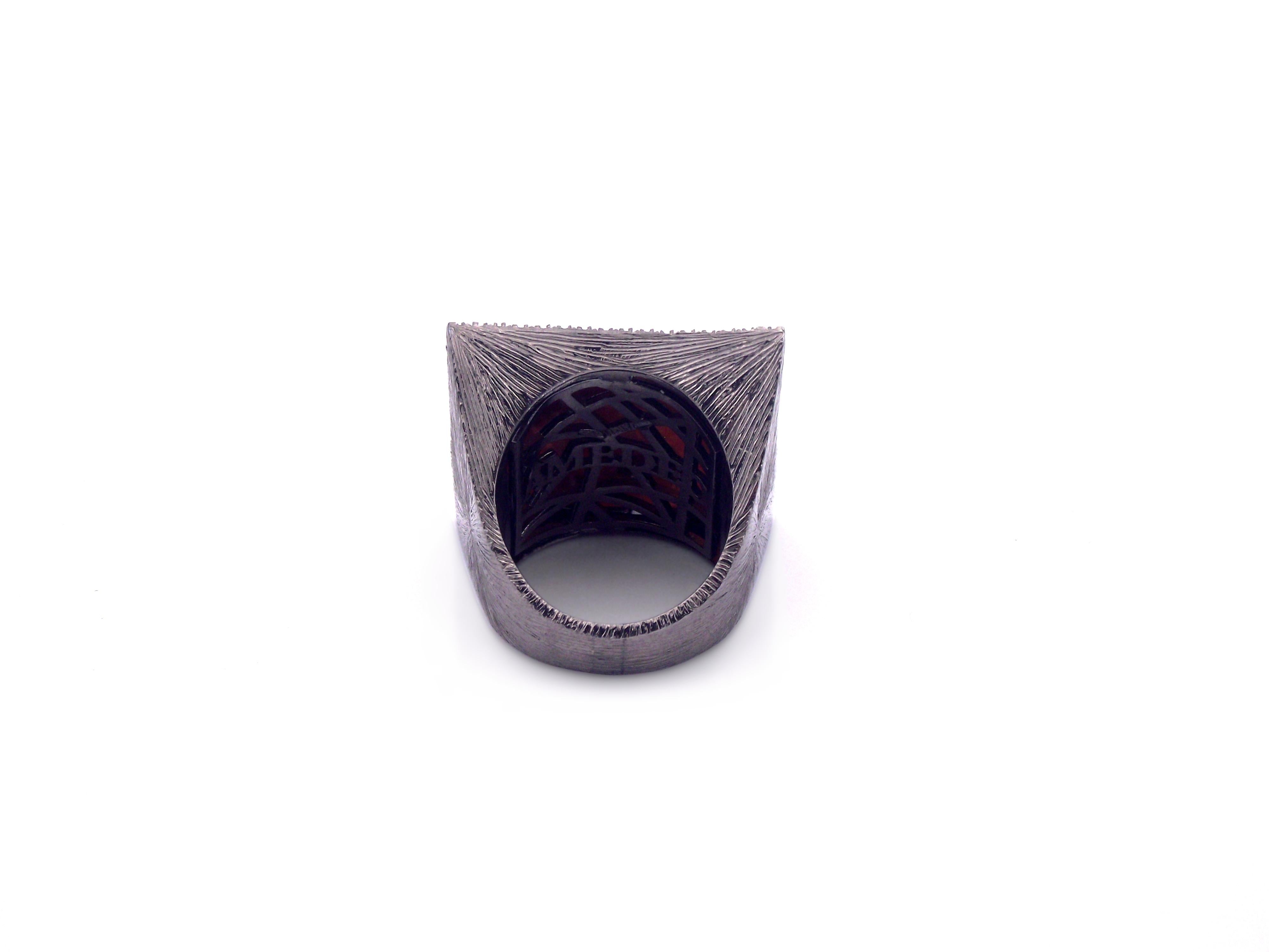 25mm sardonyx shell cameo hand-carved set on 18kt and sterling silver black, rhodium plated  with 0.58cts of black diamonds.