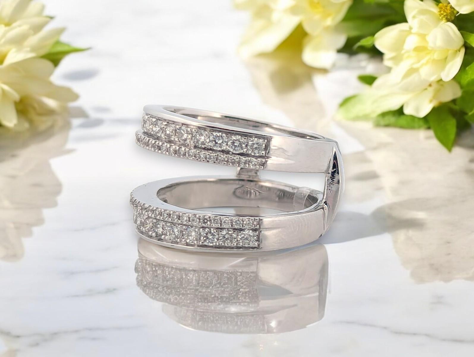 💎 14K White Gold Wrap Ring  0.80 CTW Diamonds, Size 7.25

Timeless elegance meets modern design with this 14K white gold wrap ring, featuring 0.80 carats of natural diamonds arranged in a dazzling crossover setting. The wrap-style band offers a