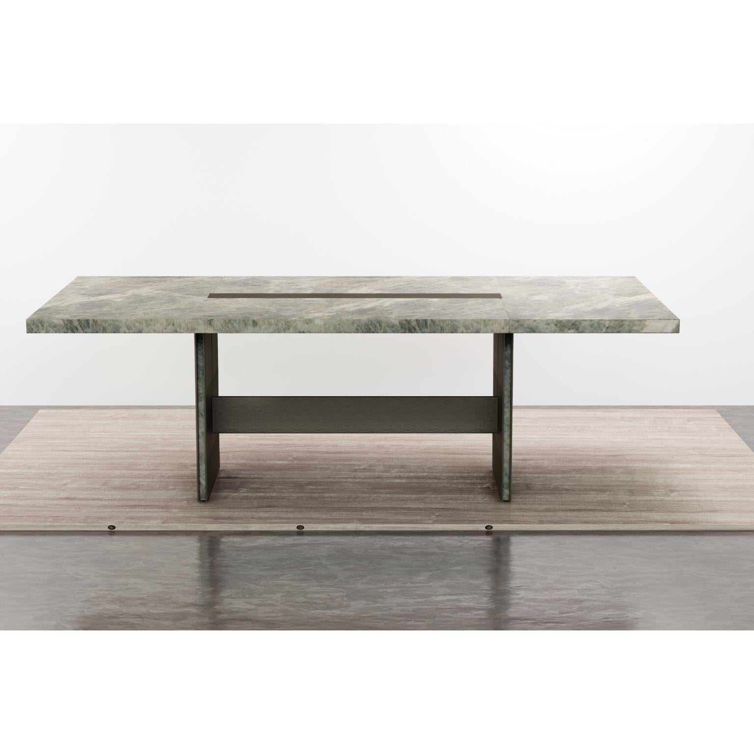 Amena dining table by Simon Hamui
Dimensions: D 330 x W 150 x H 73 cm 
Materials: stone, acrylic
Also available in different dimensions. 

Dining table designed to seat up to 20 people. The table top is made of stone
with a linear cutout down