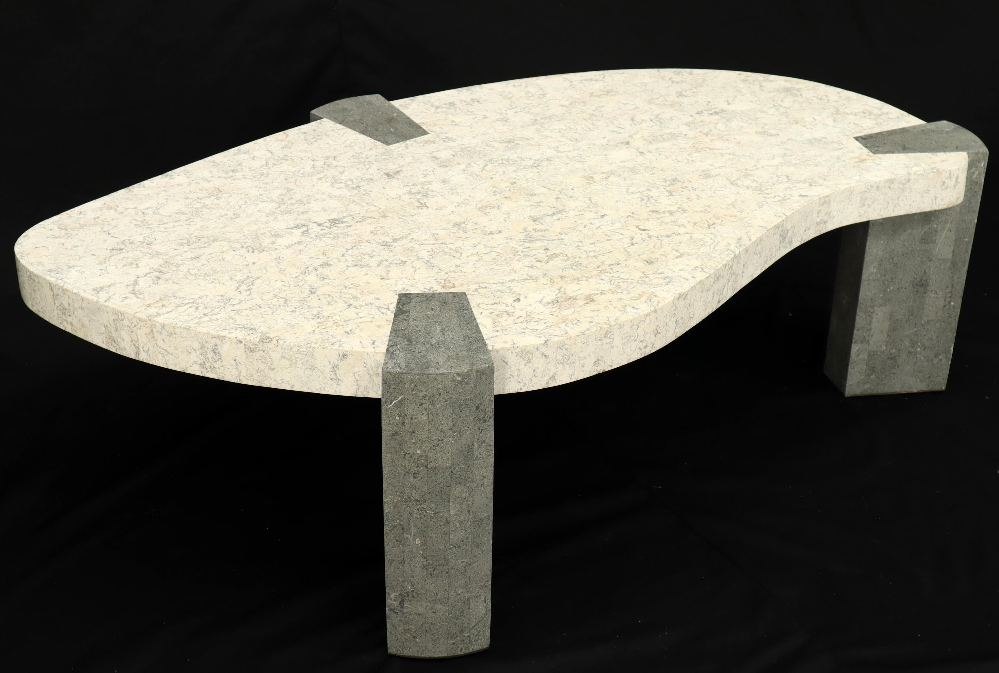 Mid-Century Modern stone veneer coffee table in style of Maitland-Smith.
   
