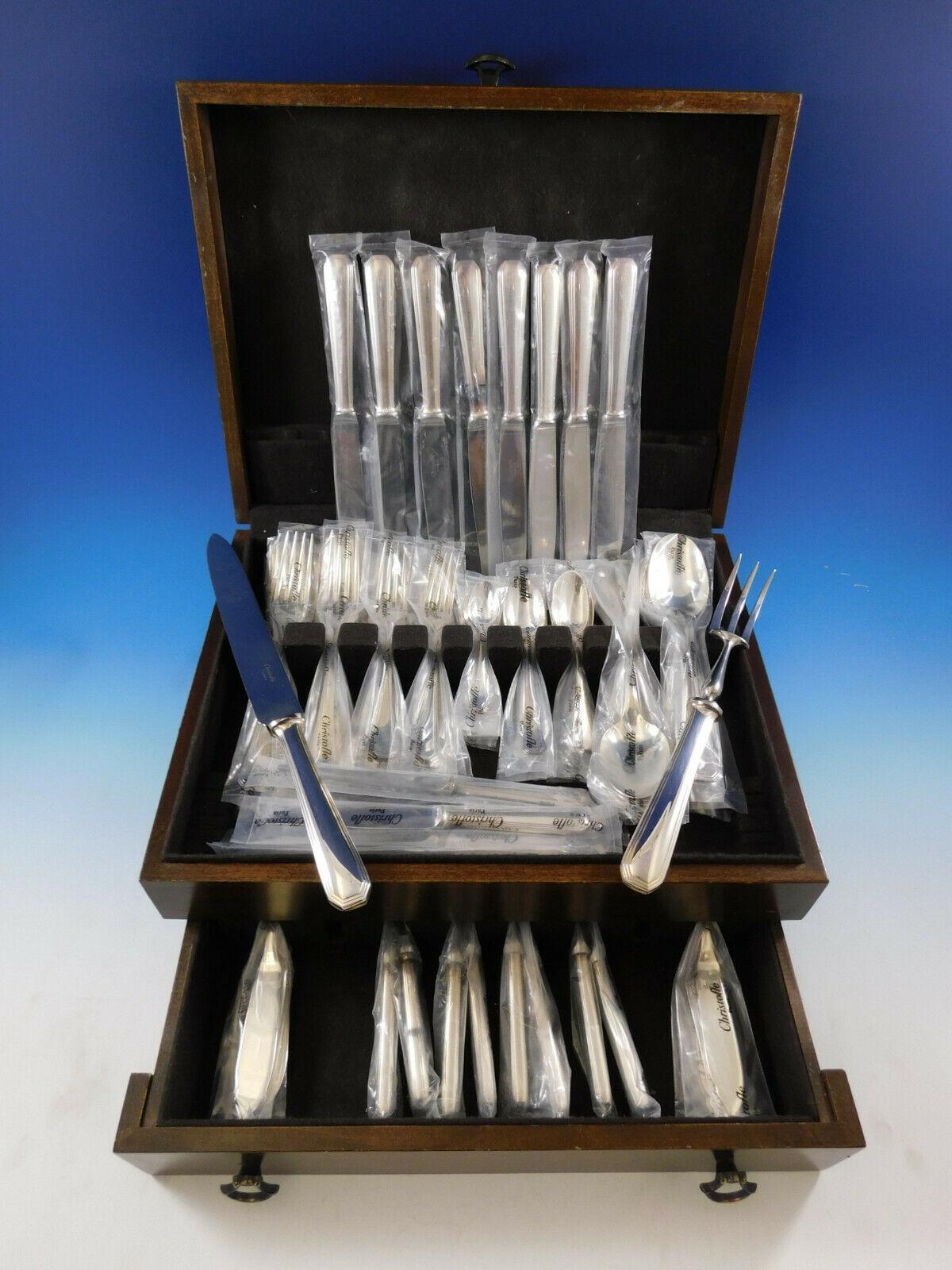 New, unused Dinner Size America by Christofle France silver plate flatware set of 74 pieces. This set includes:

8 dinner size knives, 9 1/2