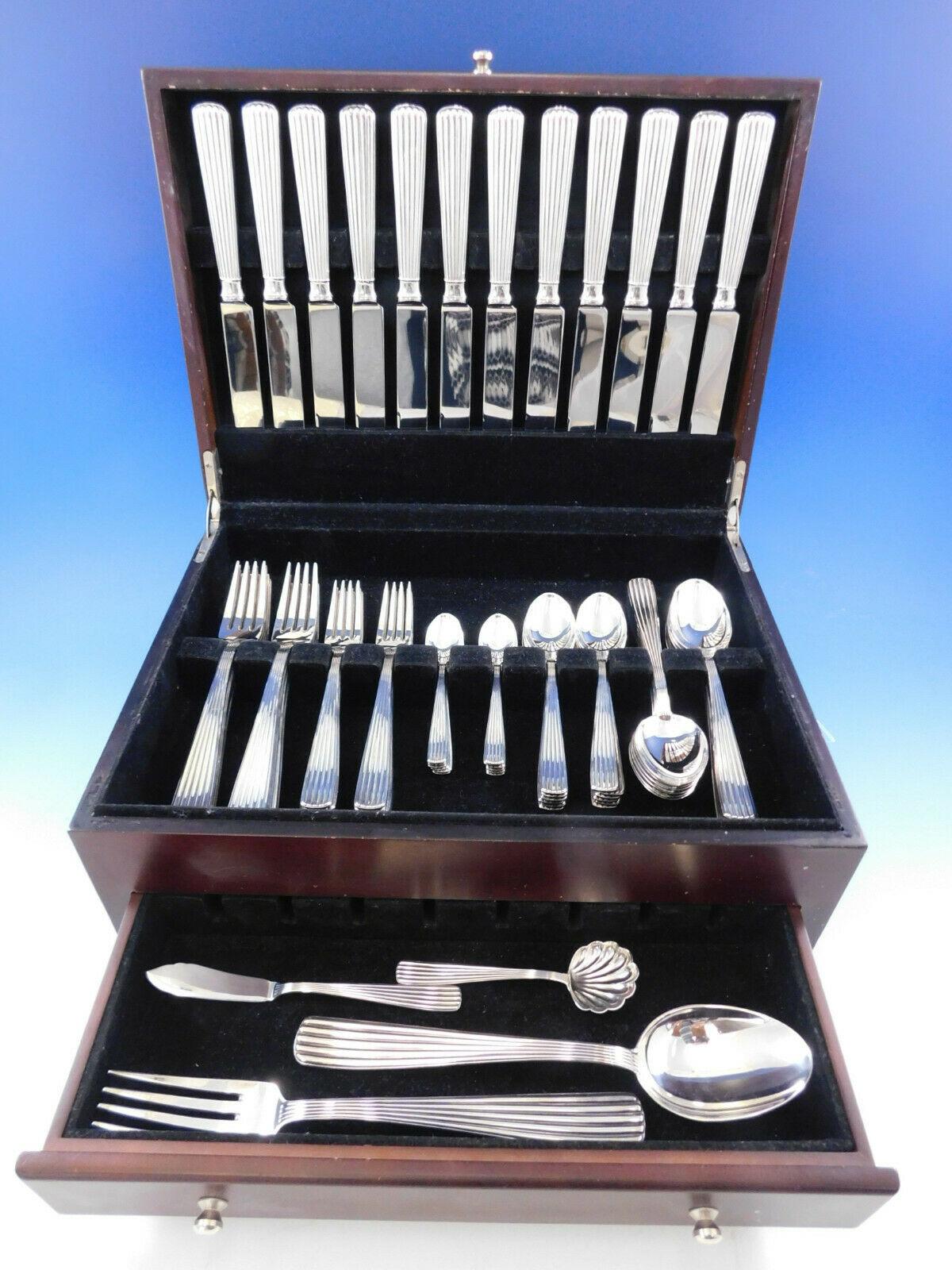 Continental size America by Fina Italy sterling silver flatware set, 76 pieces. This set includes:

12 continental size knives, 9 3/4