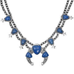 A Silver Silver Lapis Gemstone Squash Blossom Necklace, 18 to 21 Inches