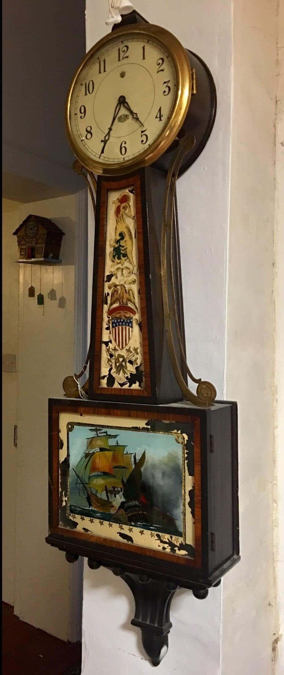 This clock is in good working order. Some parts of the hand painted glass panel are worn as shown on the photos. Please study the photos carefully as form part of the description.