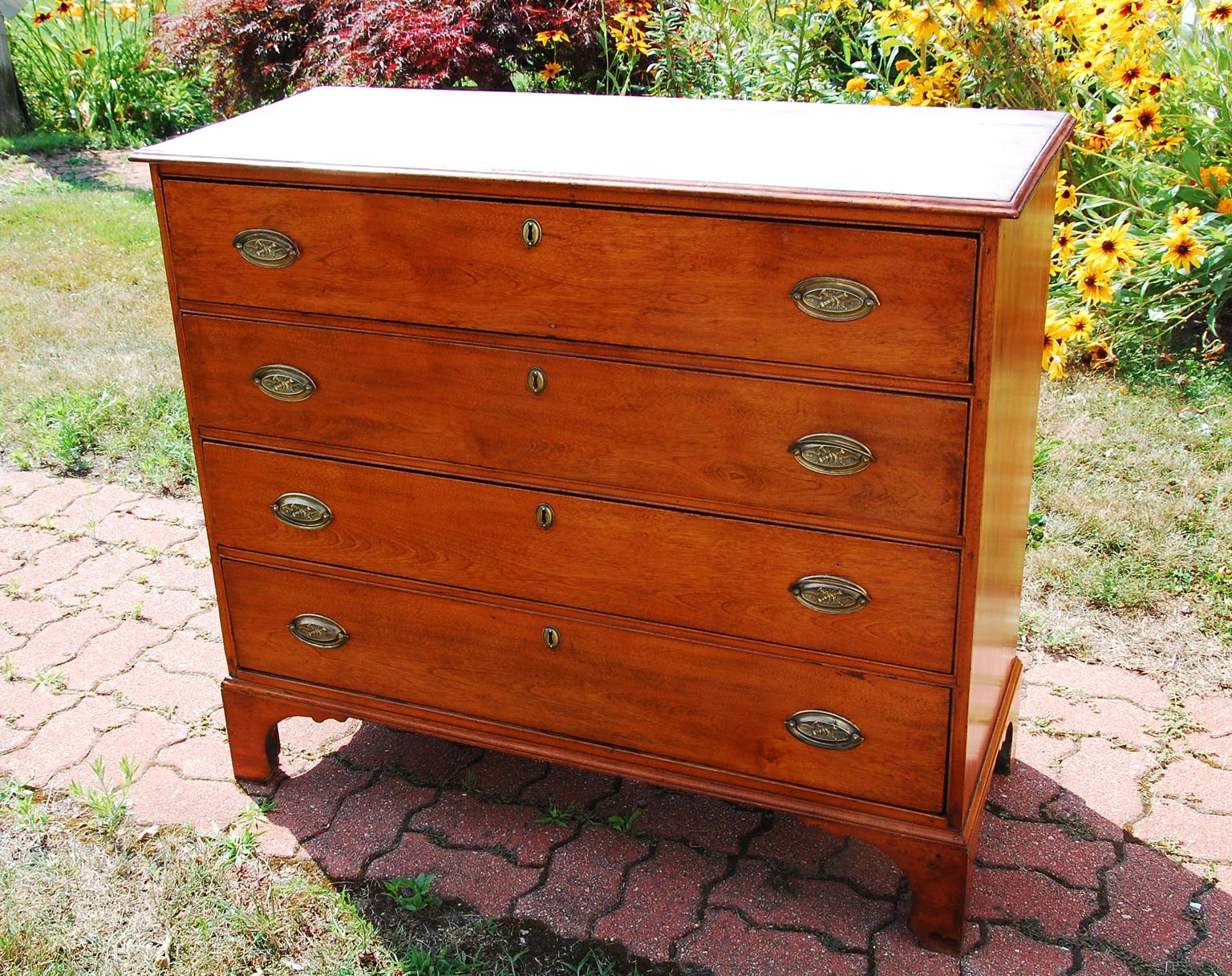 American Federal period maple chest of four graduated drawers with thumbnail molding to carcass and molded bracket base and top. The timber was chosen carefully for this chest, the carcass and drawers having very straight graining while the top has