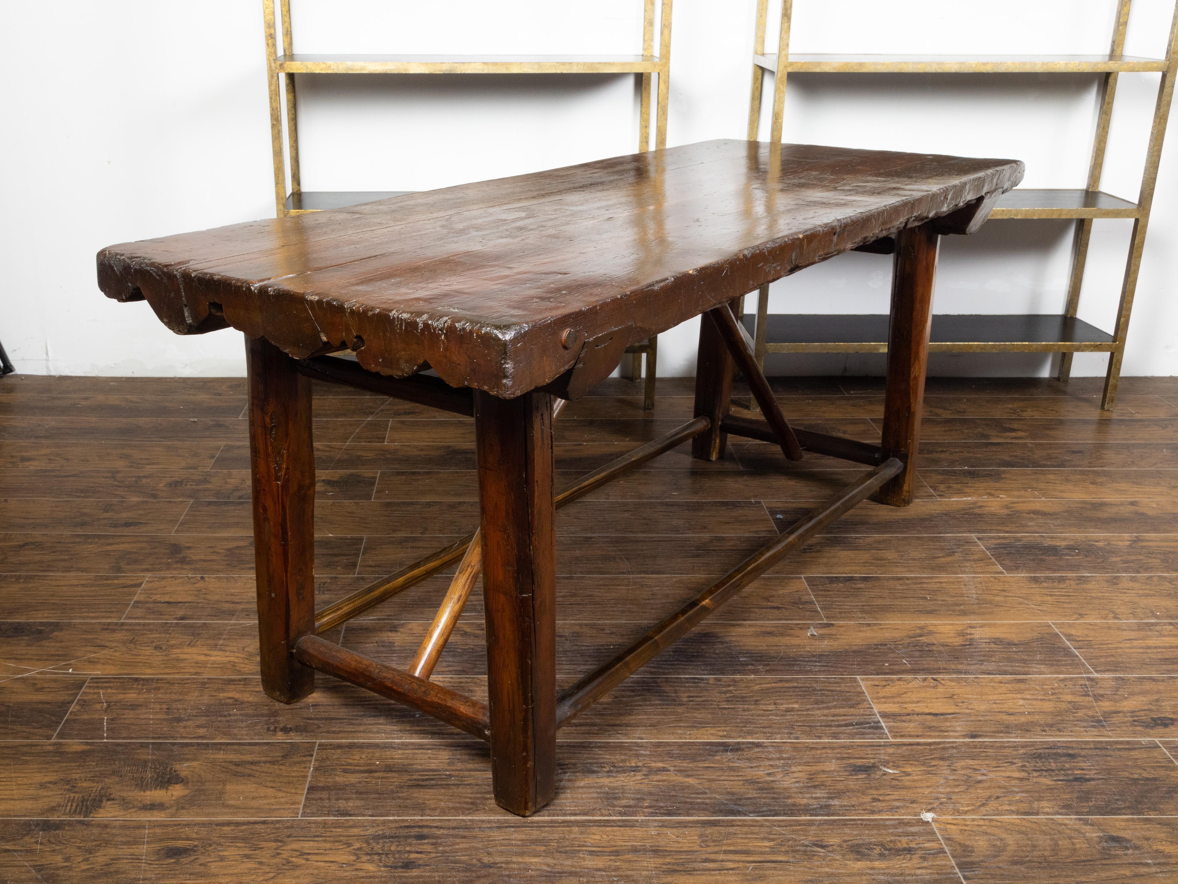American 1900s Rustic Pine Log Table with Straight Legs and Side Stretchers In Good Condition For Sale In Atlanta, GA