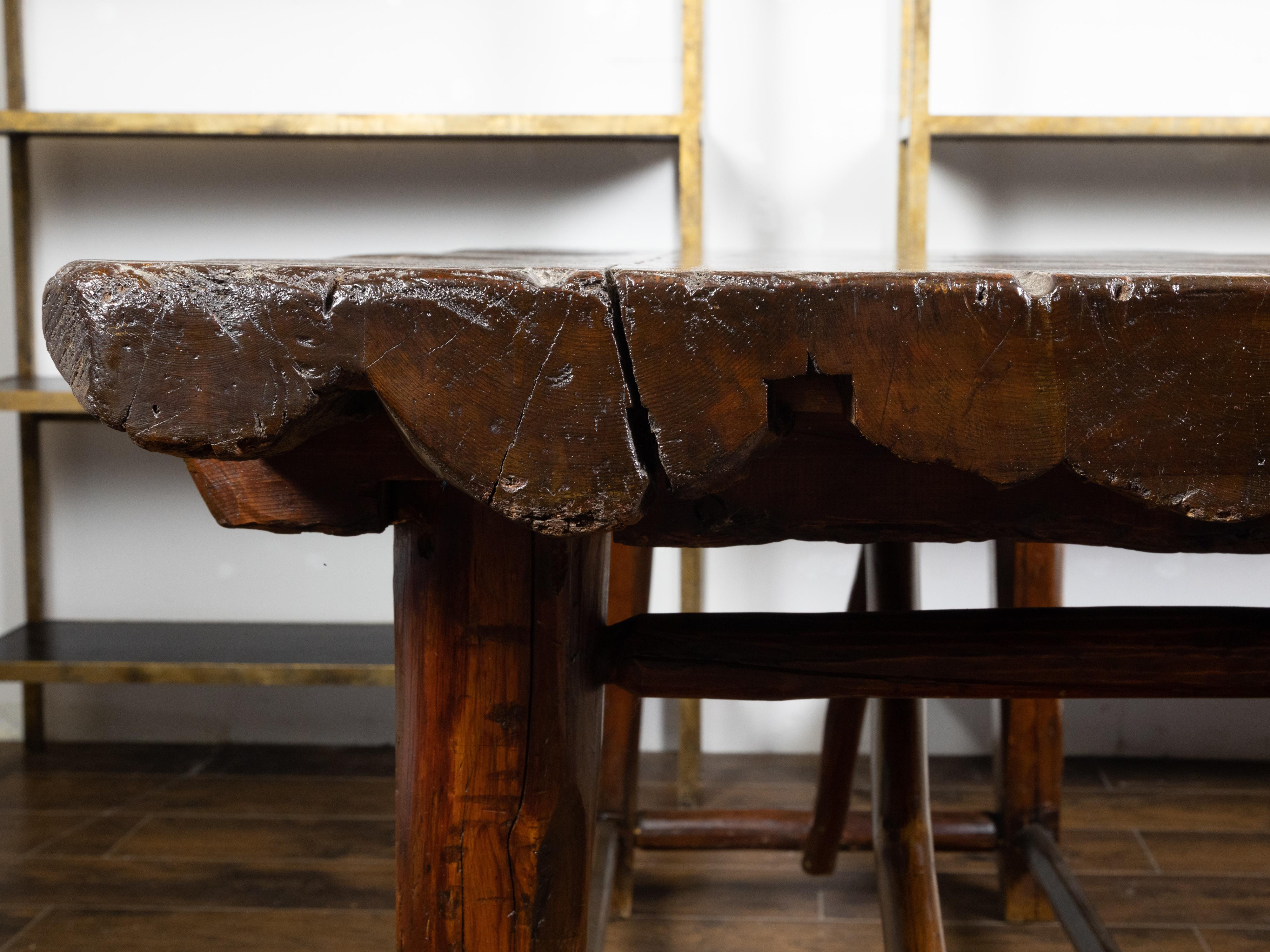 American 1900s Rustic Pine Log Table with Straight Legs and Side Stretchers For Sale 1