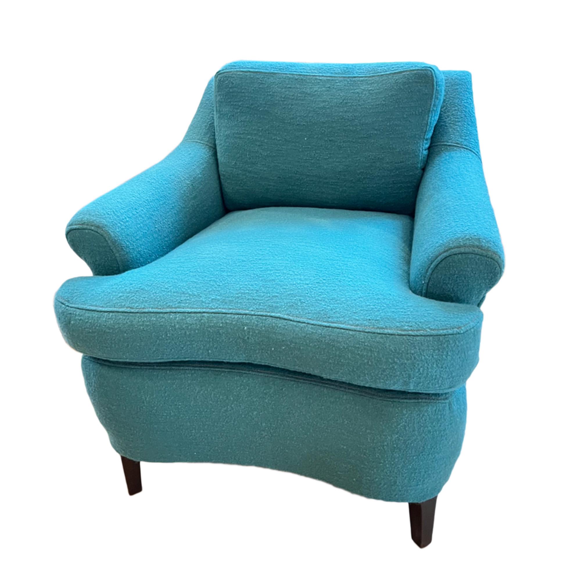 This beautiful armchair has been expertly covered in 'Orkney - Pine' from the Isle Mill. This is what they say about the fabric:

'Orkney is a beautifully textural boucle collection with an extensive offering of vibrant colours ways in blues, reds,