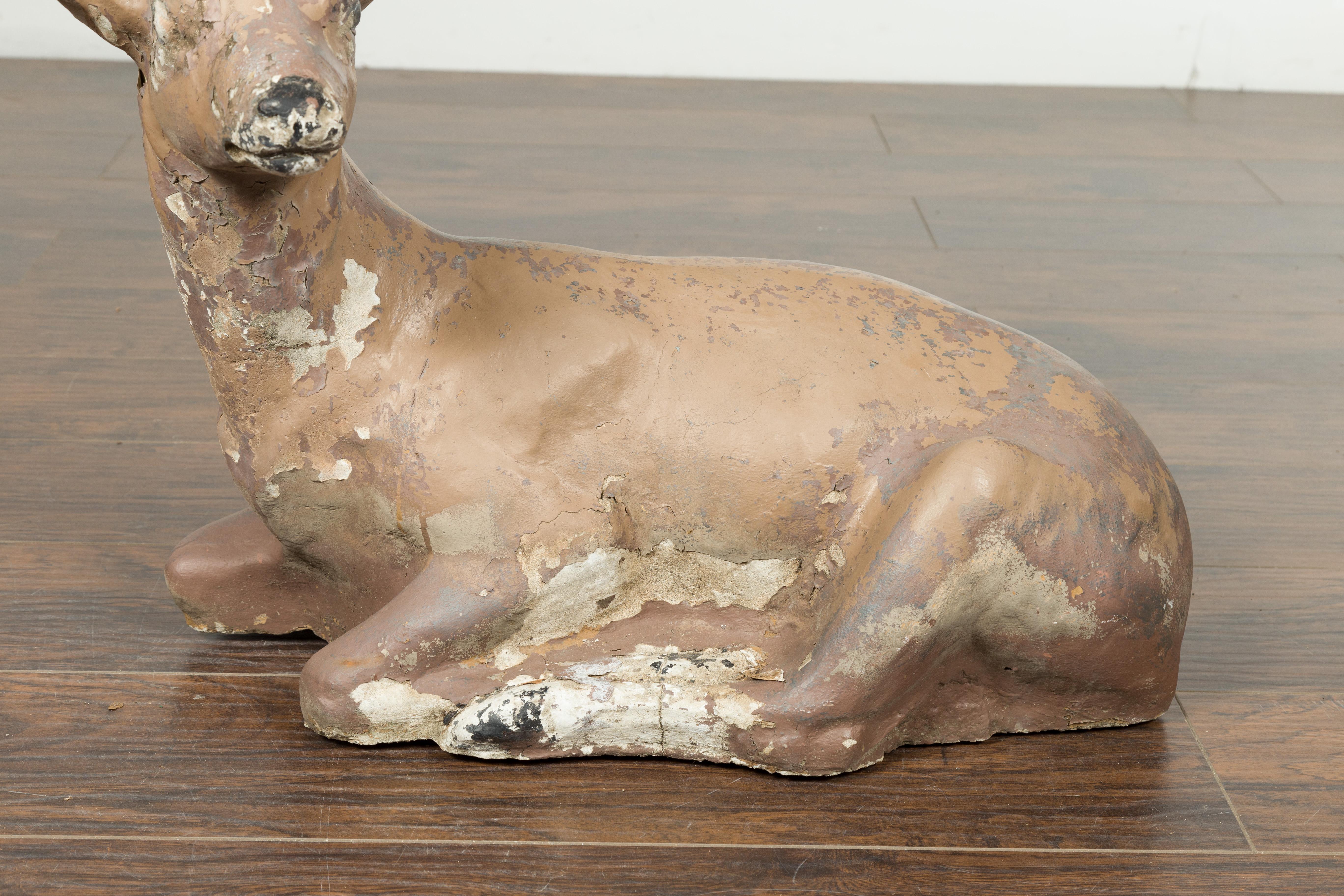American 1950s Concrete Reclining Deer with Antlers and Weathered Appearance In Good Condition For Sale In Atlanta, GA