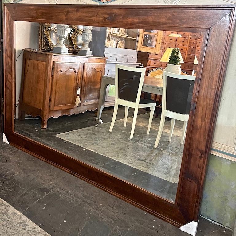 American 1960s Stained Walnut Over Mantel Mirror With Original Beveled Glass For Sale 1