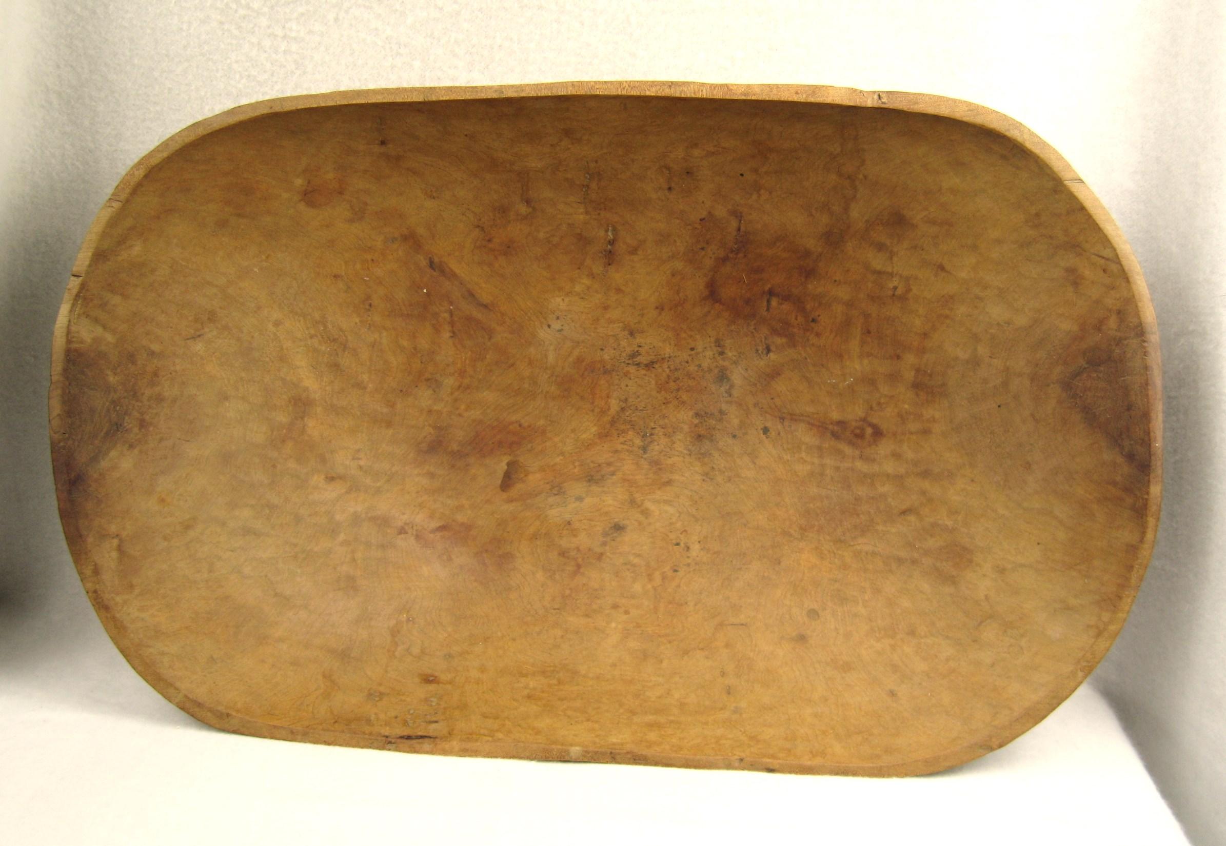 This is a wonderful American 19th-century primitive cherry bowl or trencher, hand carved very thin 1/4