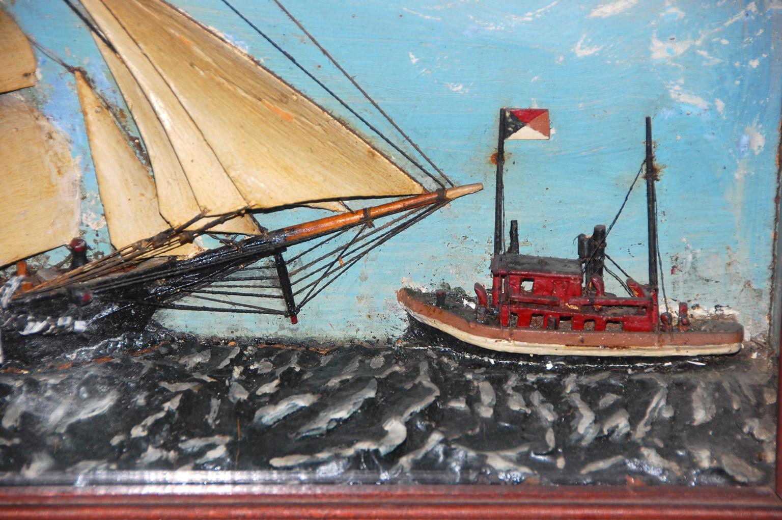 American 19th century ship diorama of a barkentine and tugboat. The ships are all painted wood and the sea is plaster. The original walnut frame has never been refinished. Probably Maine made.