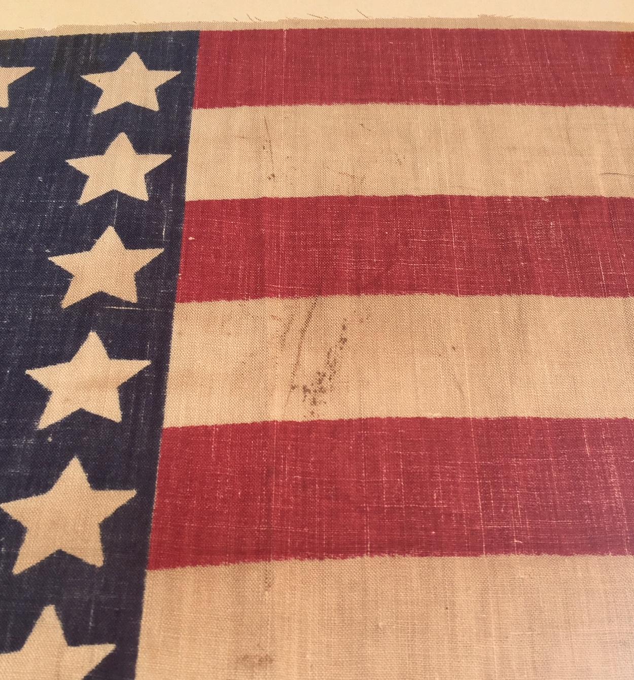 Antique 42 Star American flag commemorating Washington Statehood, circa 1890. This was never an official U.S. Flag by Act of Congress, but rather a 