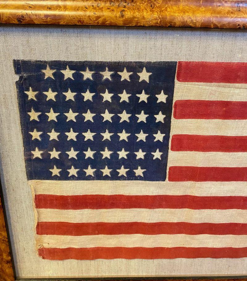 Rare Antique American 44 Star Flag, circa 1891, marking admission of Wyoming as a state in 1891. This was an official flag of the United States for only five years, making it one of the rarer of our antique flags. This one has an unusual 