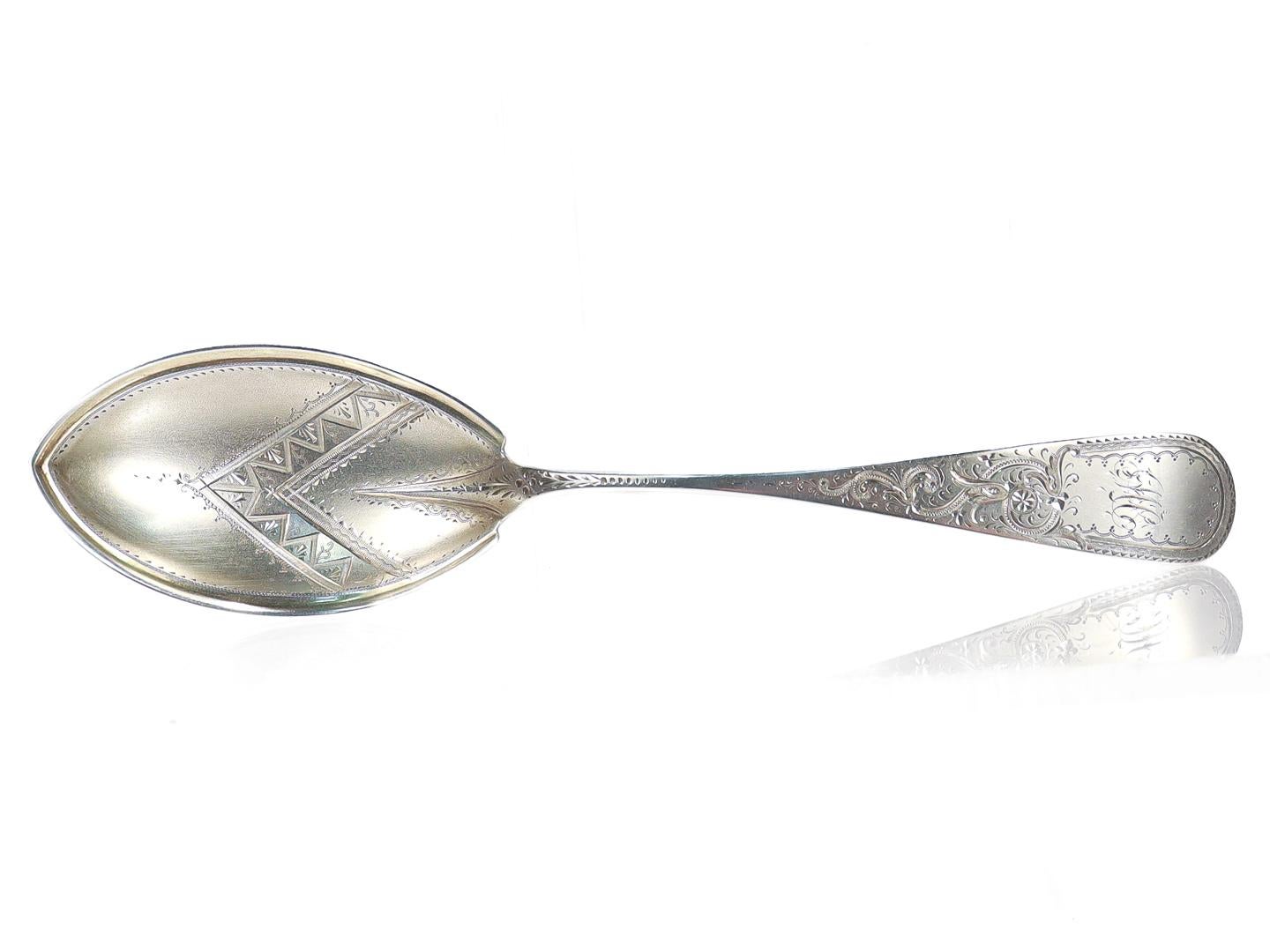 A fine Aesthetic Period silver serving spoon.

By R. & W. Wilson.

In sterling silver.

With intricate bright cut engraving throughout to both the bowl and the handle.

Marked to the reverse of the handle for R&W Wilson / Sterling.

Simply a